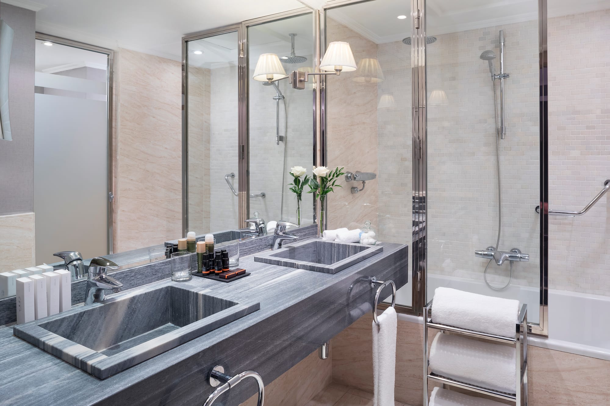 a bathroom with a shower and sink