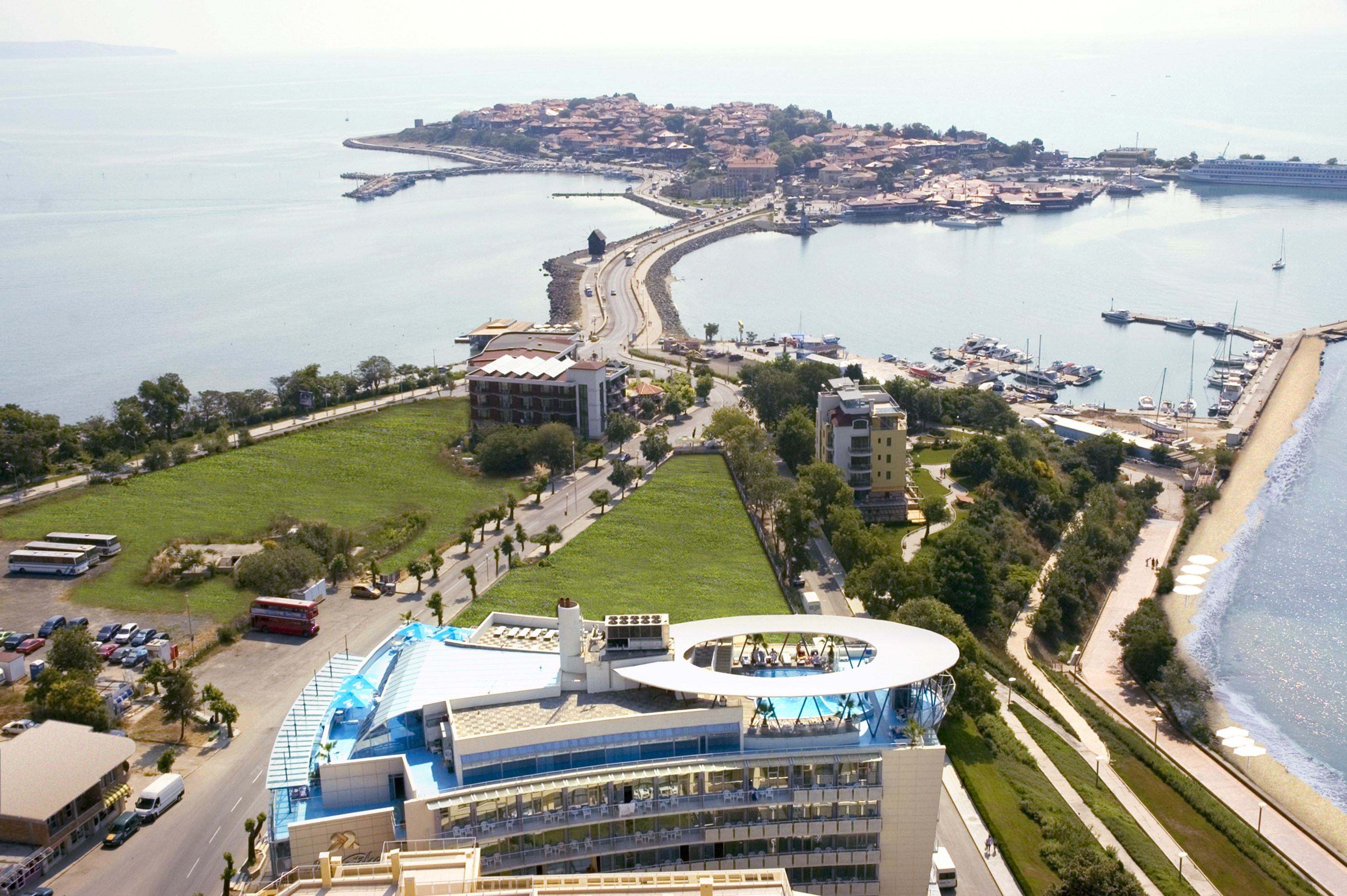 a aerial view of a city and water
