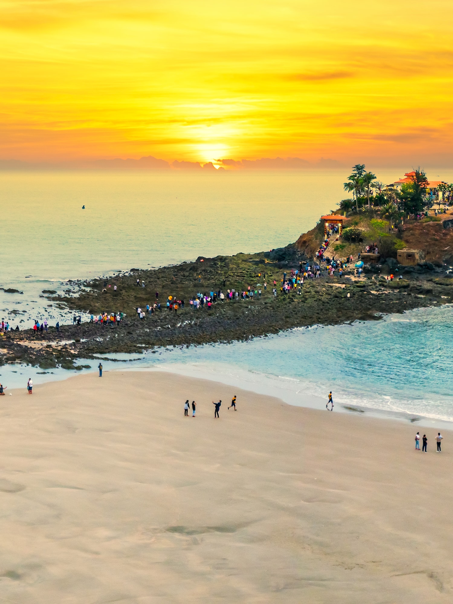 a group of people on a beach
