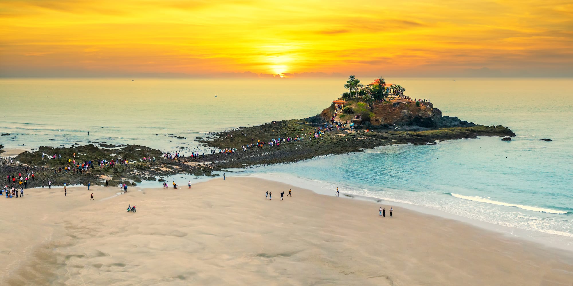 a group of people on a beach