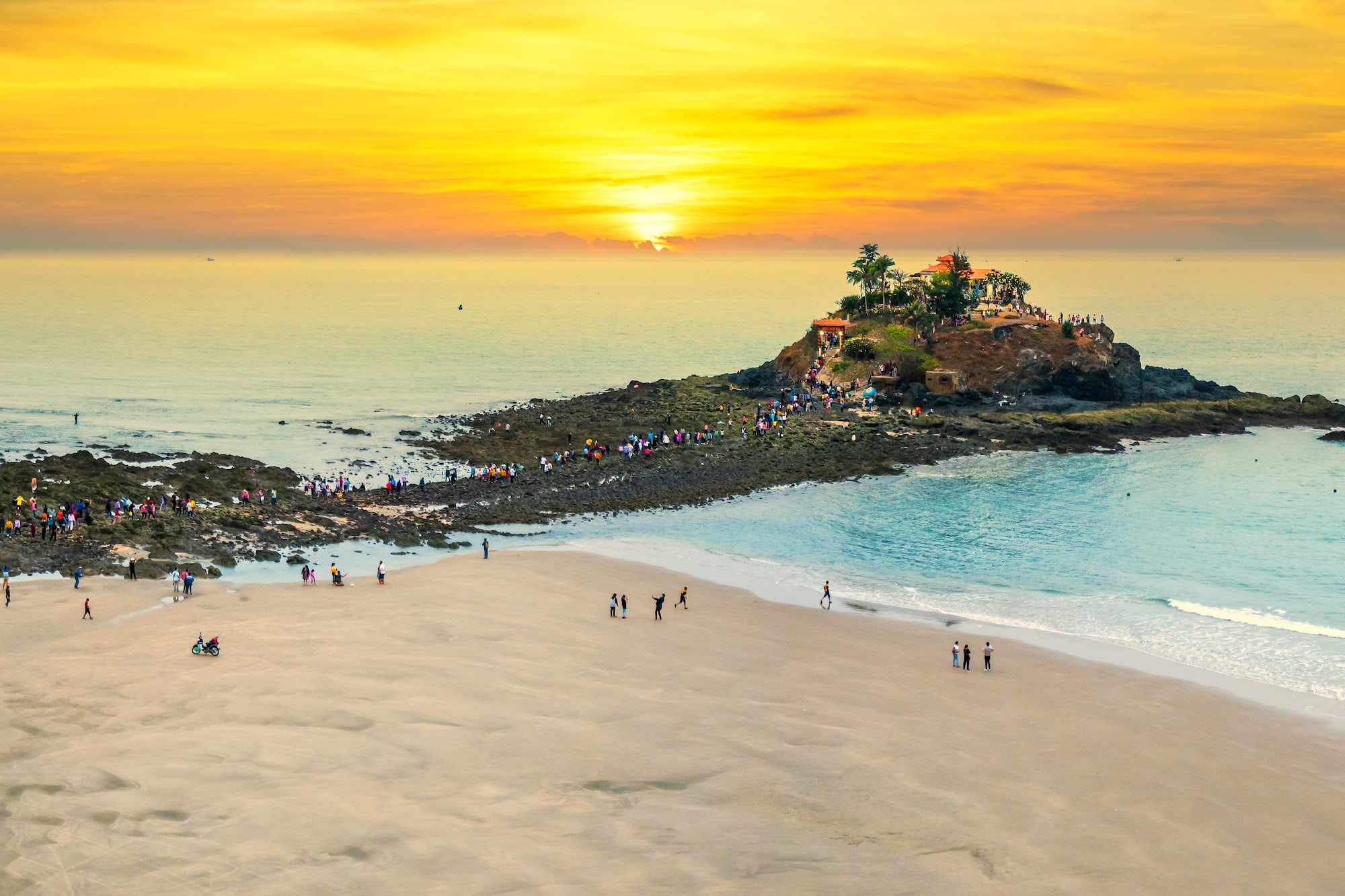 a group of people on a beach