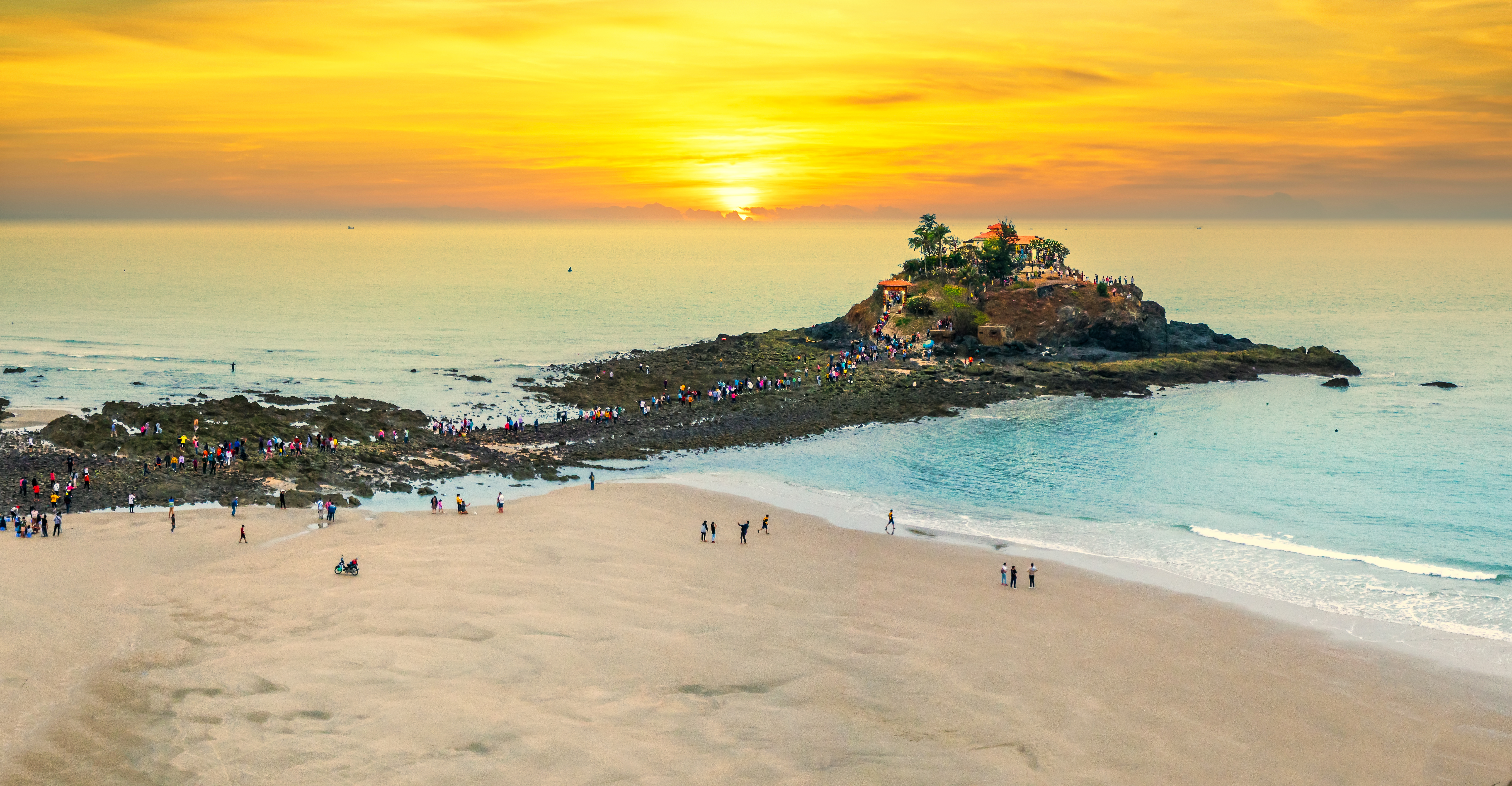 a group of people on a beach