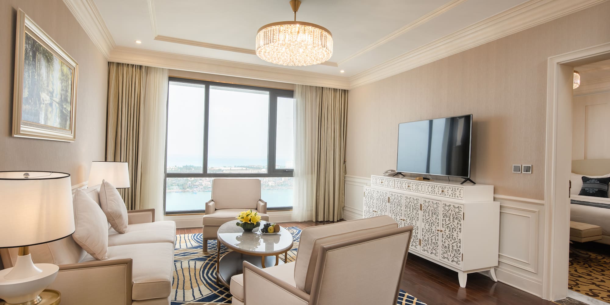 a living room with a television and couches