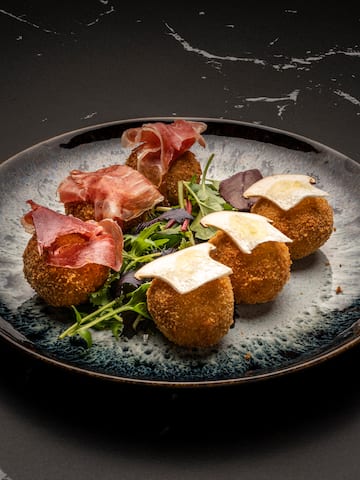 a plate of food on a marbled surface