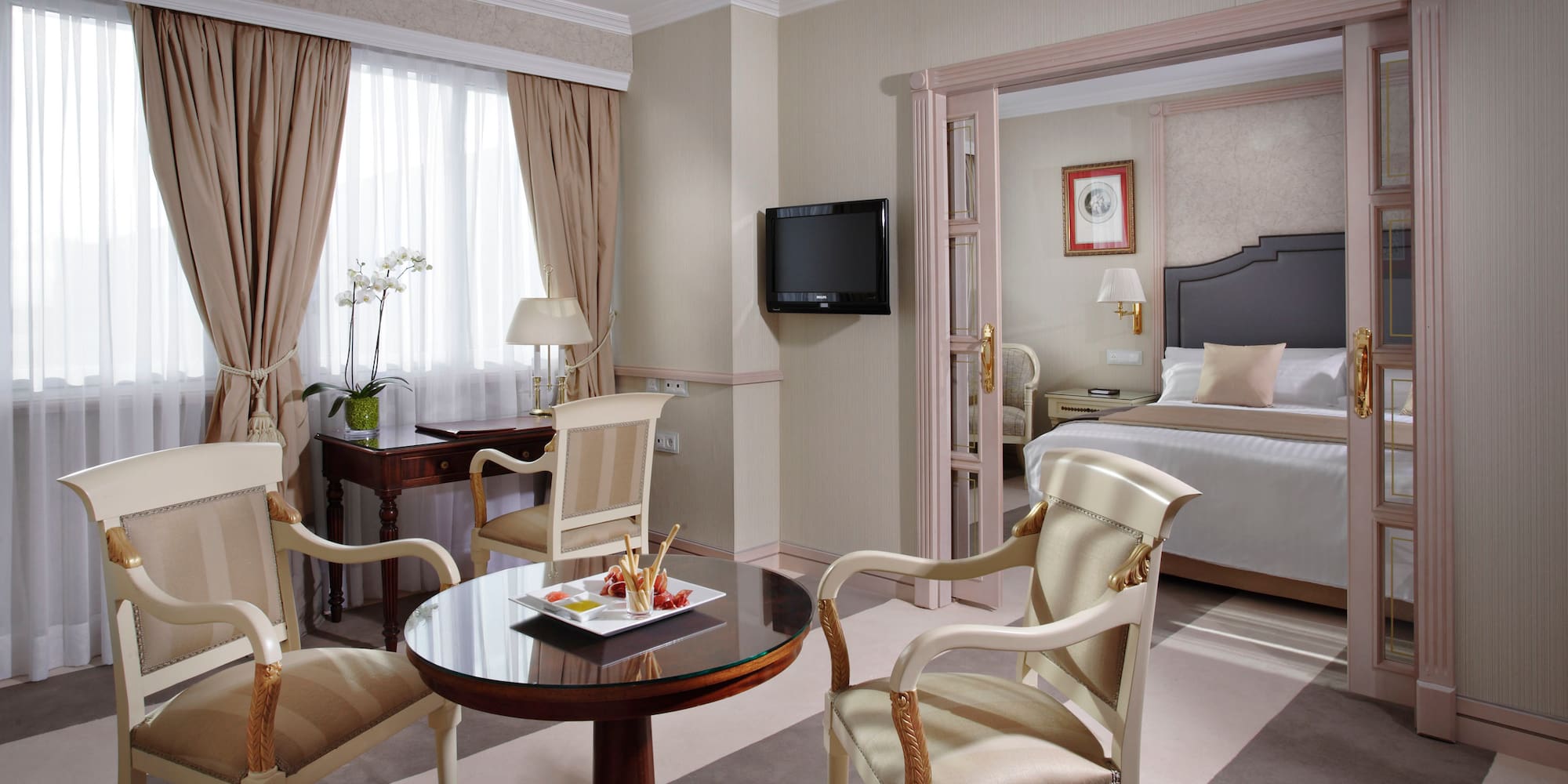 a room with a bed and a table