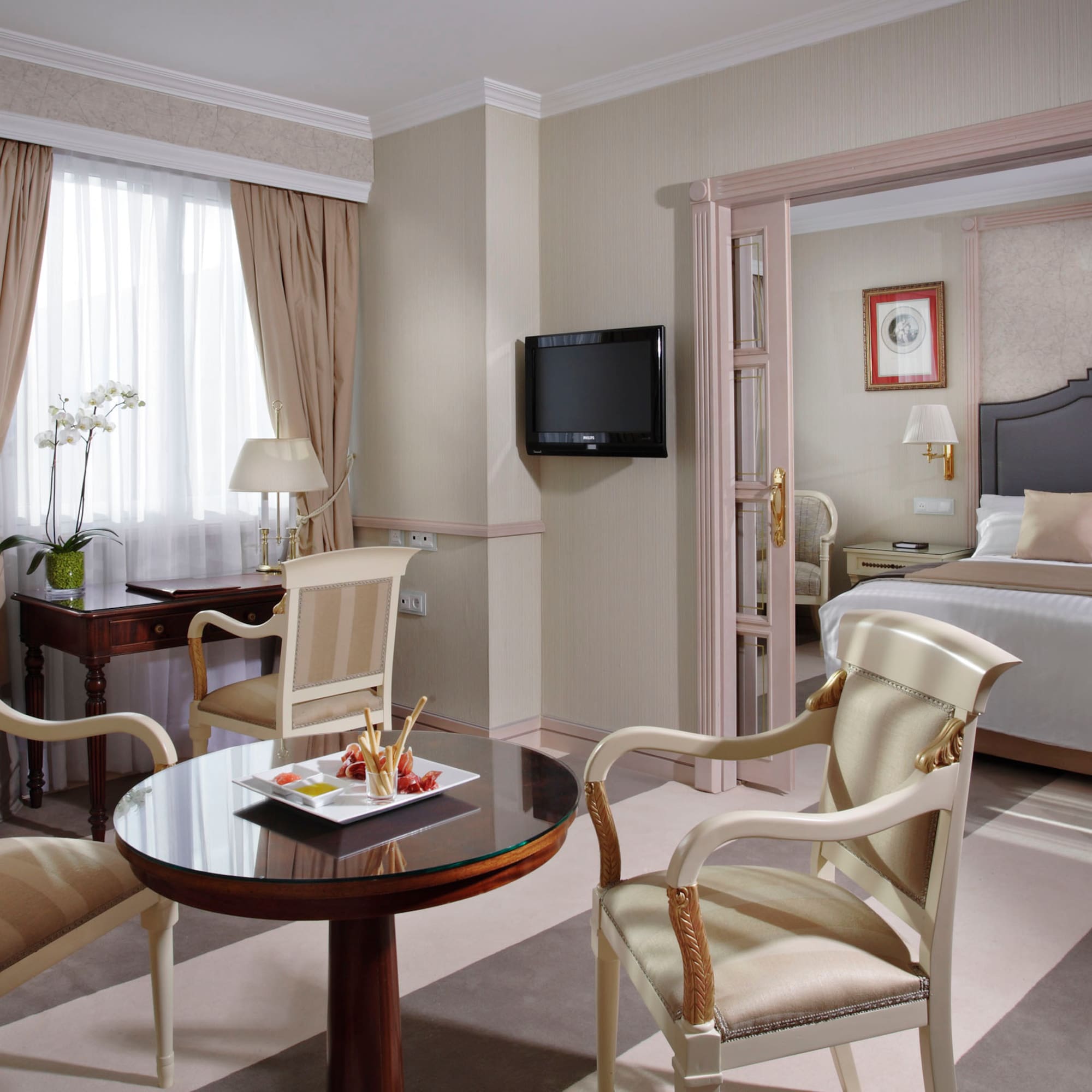 a room with a bed and a table