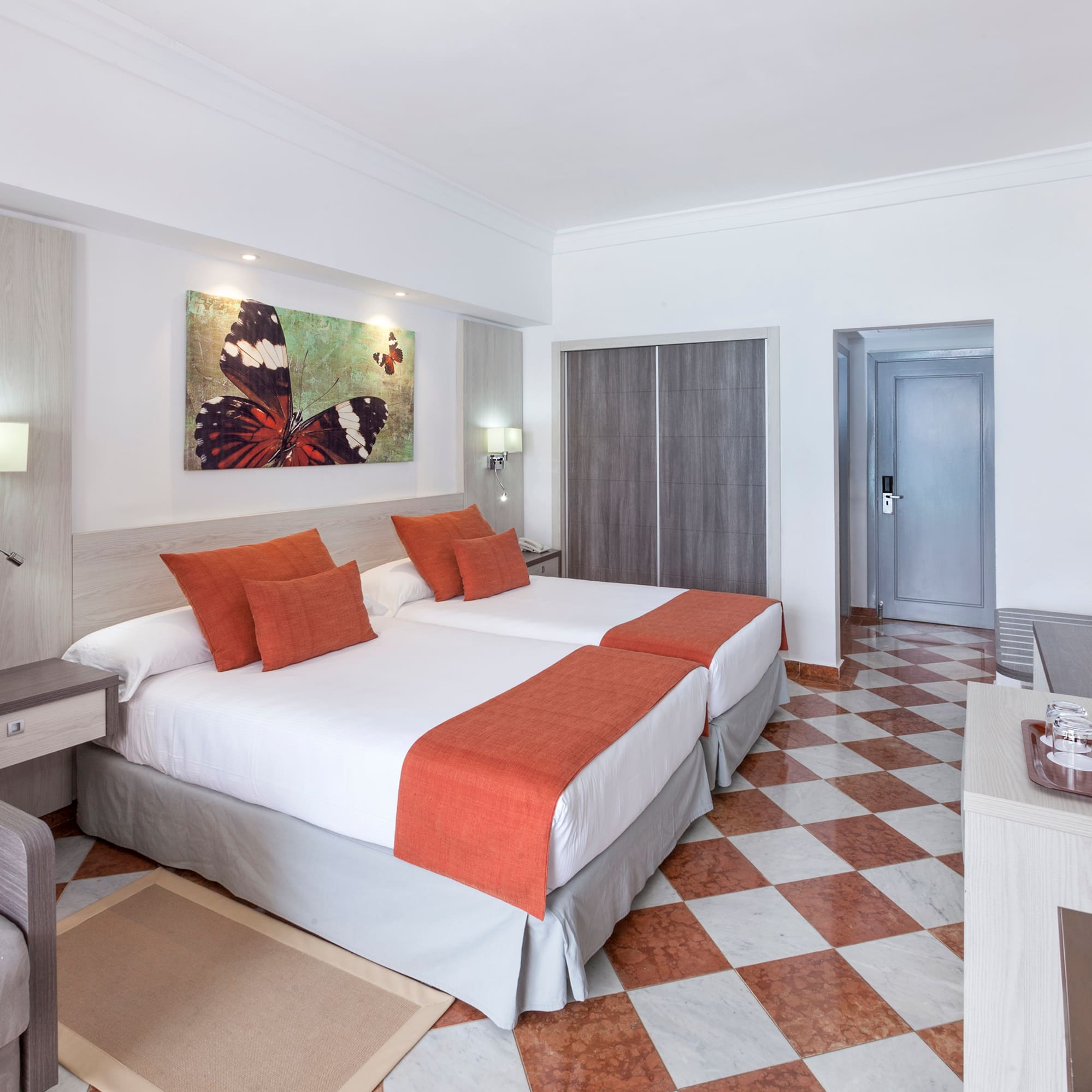 a room with a bed and a chair