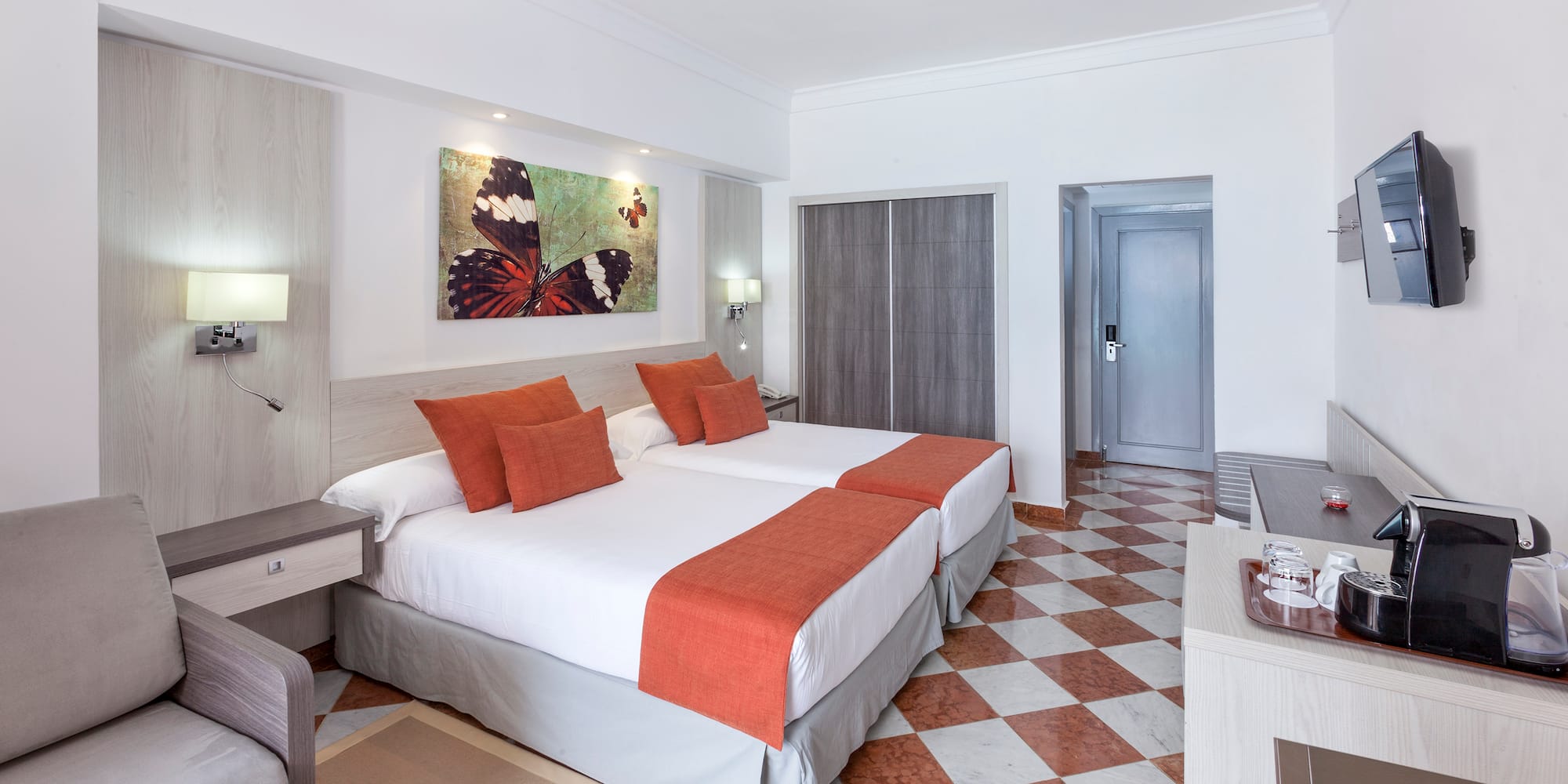 a room with a bed and a chair