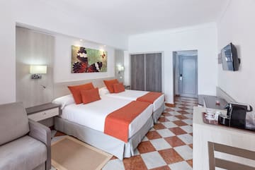 a room with a bed and a chair