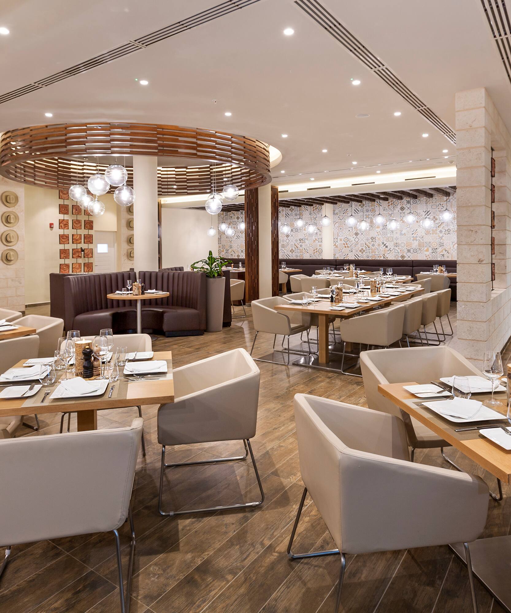 a restaurant with tables and chairs