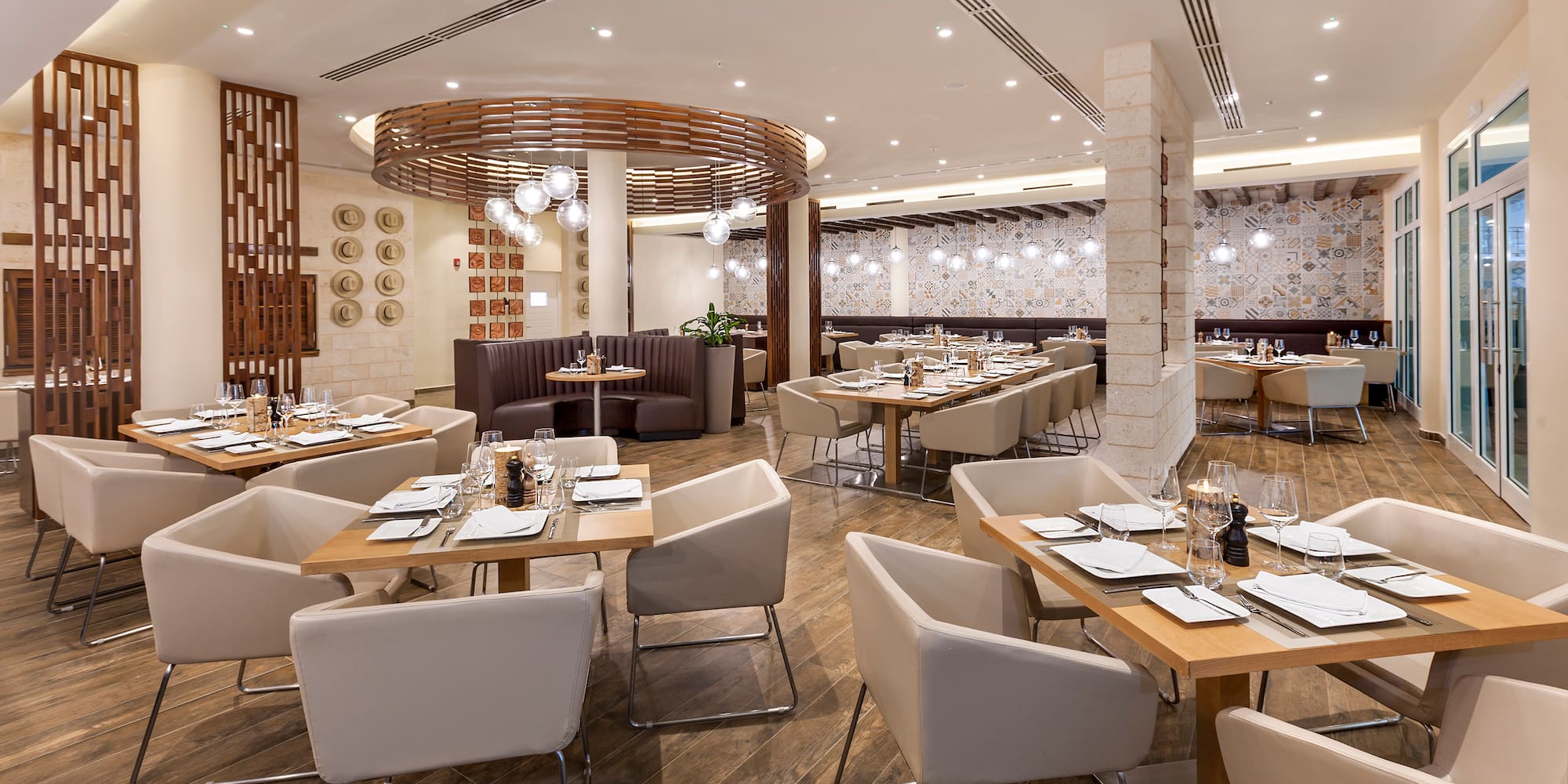 a restaurant with tables and chairs