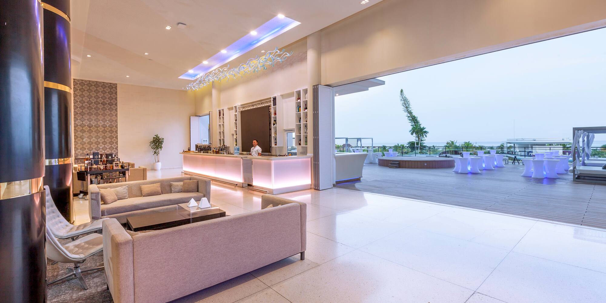 a reception area with a large open door