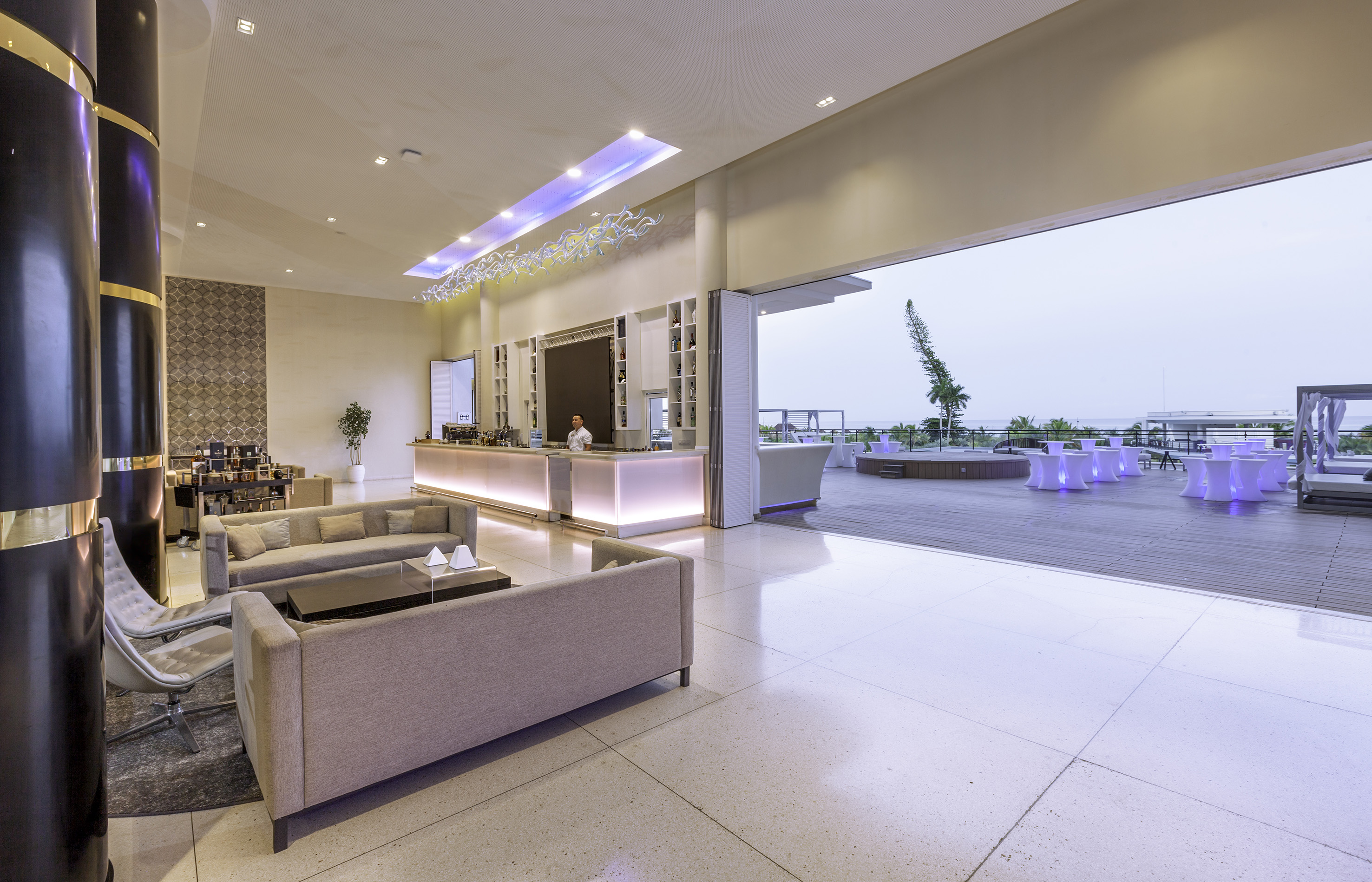 a reception area with a large open door