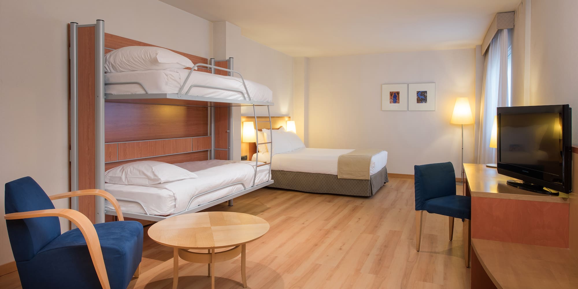 a room with bunk beds and a table