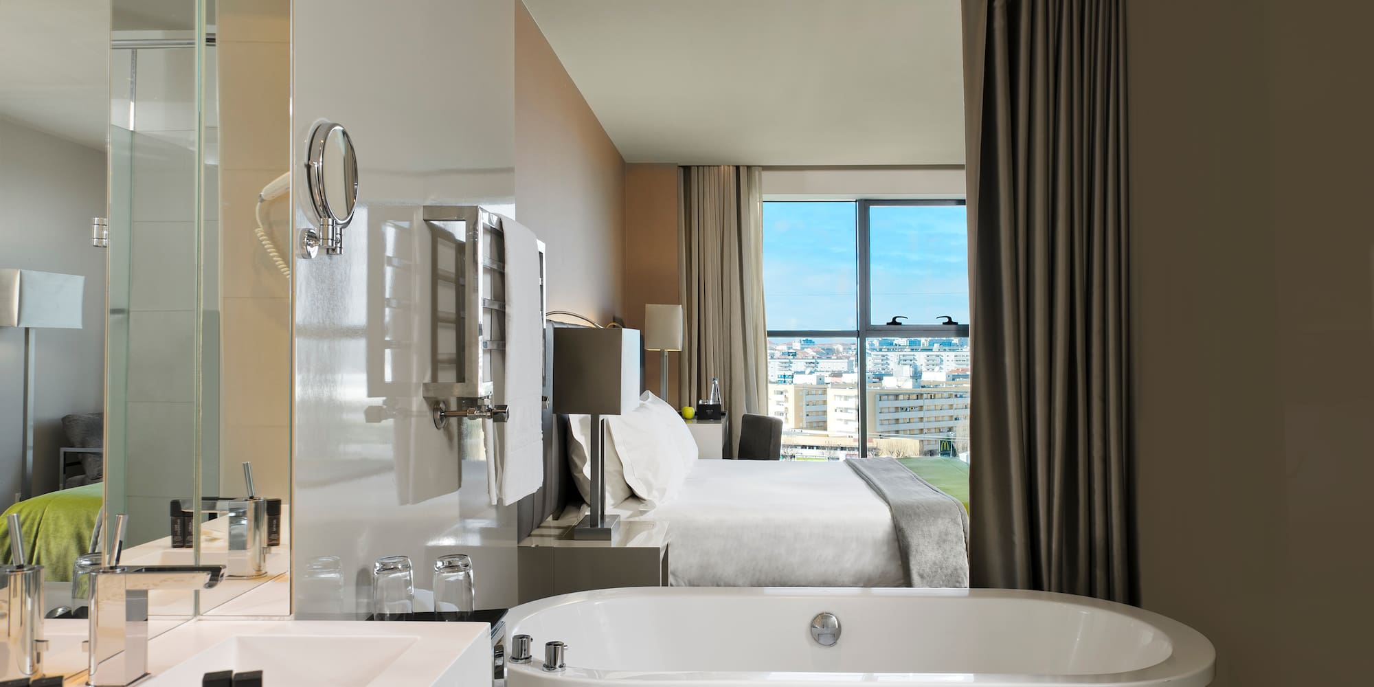 a bathroom with a bathtub and a window