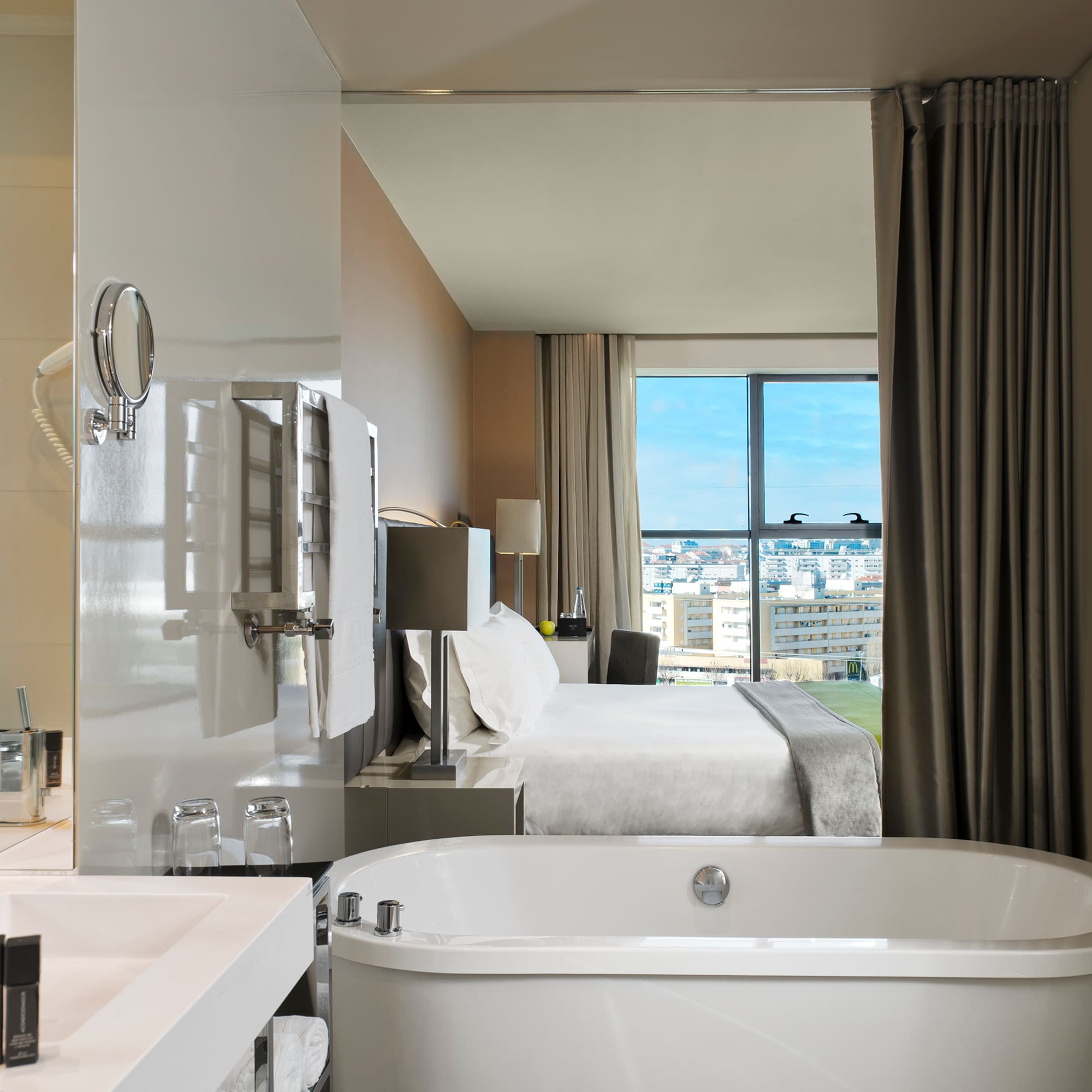 a bathroom with a bathtub and a window