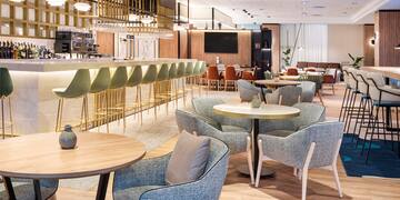 a room with tables and chairs