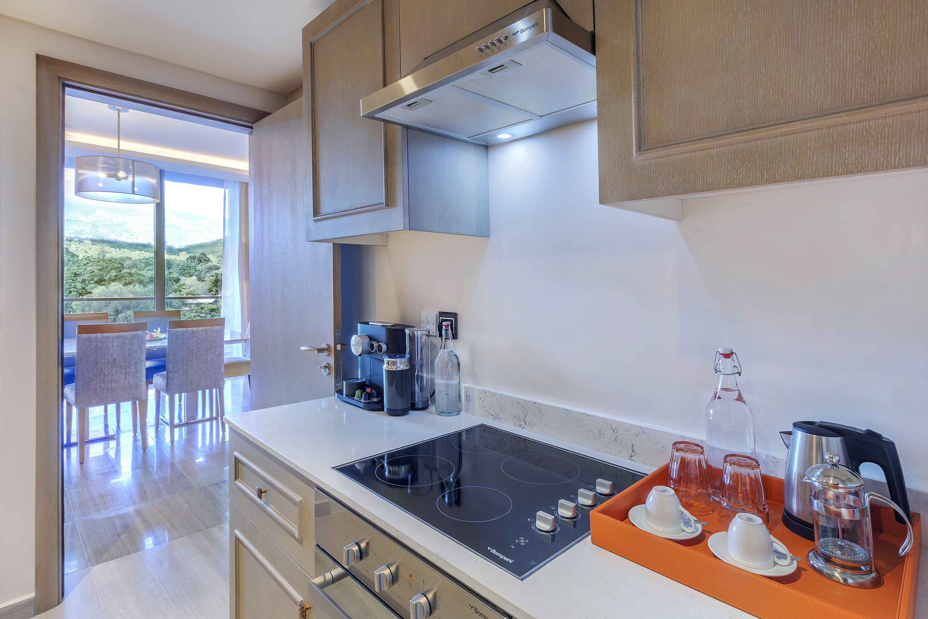 a kitchen with a stove and a stove top