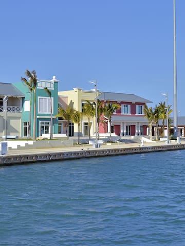 a row of houses along a body of water