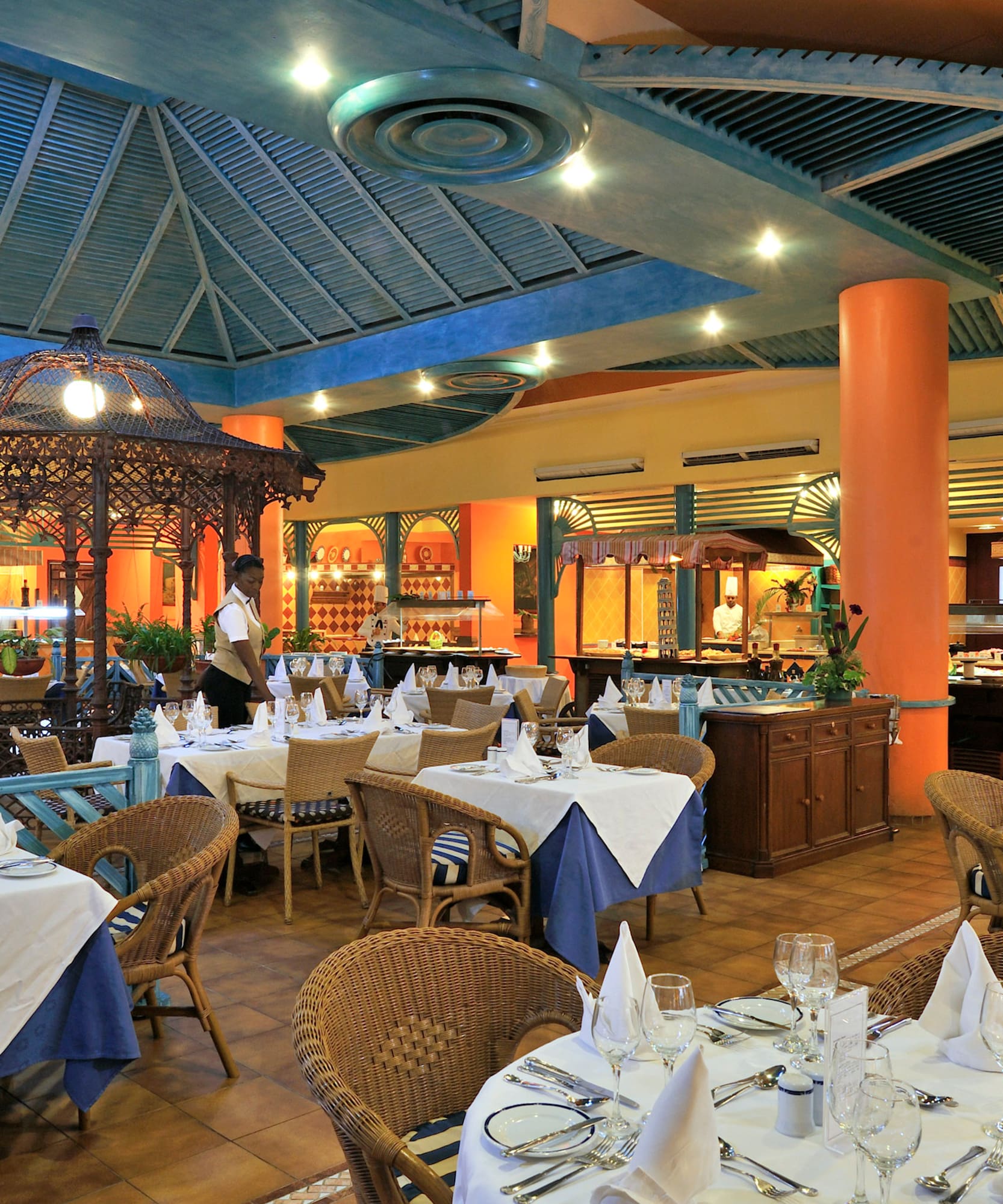 a restaurant with tables and chairs