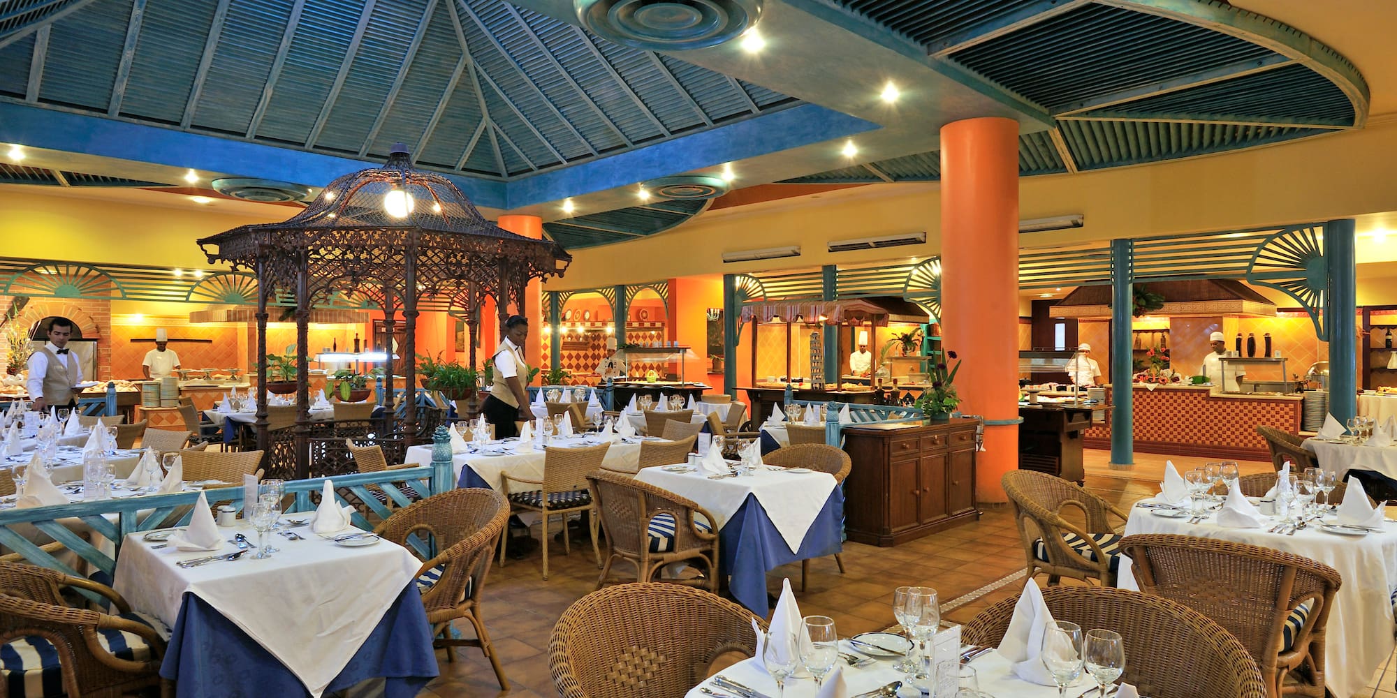 a restaurant with tables and chairs