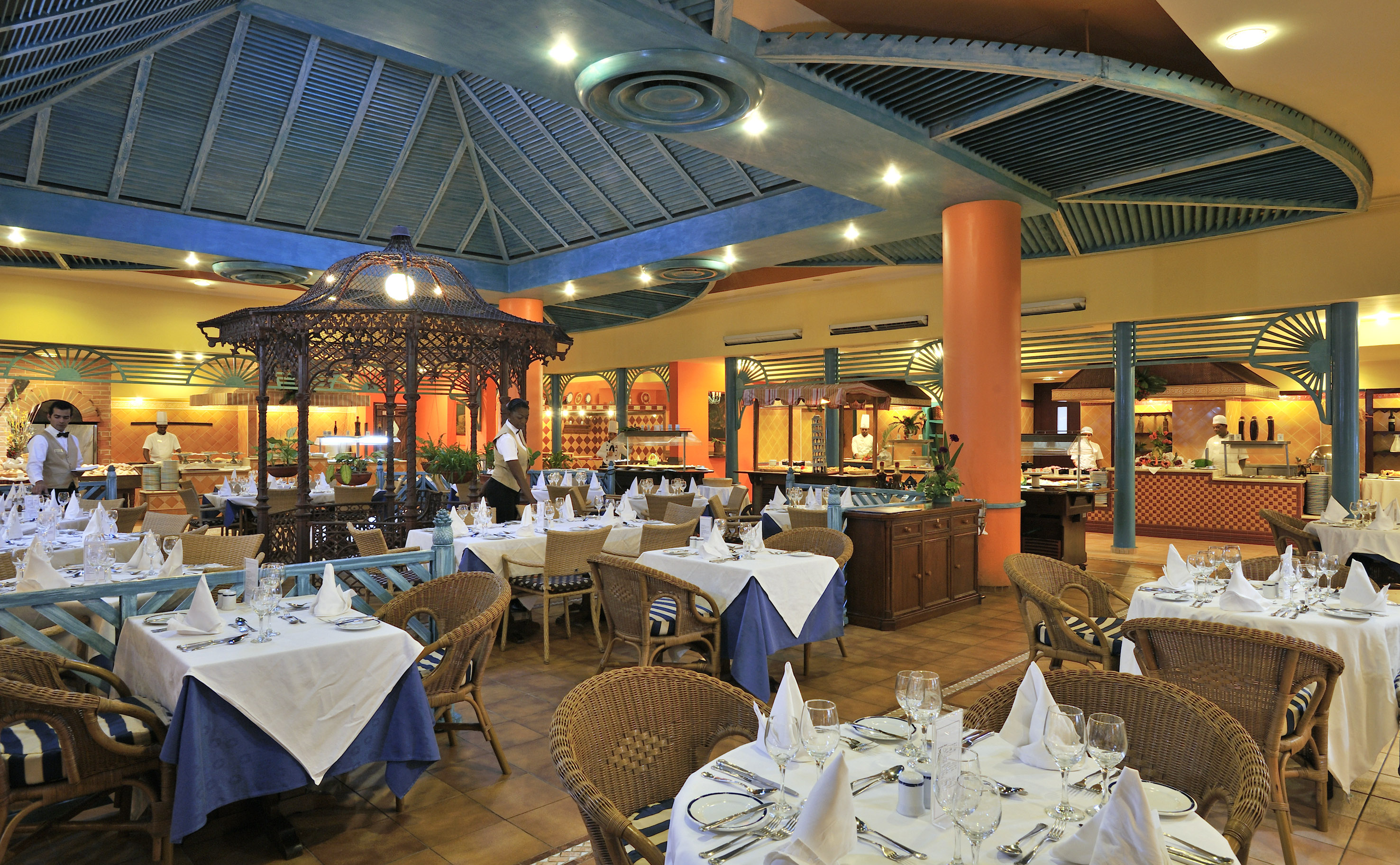 a restaurant with tables and chairs