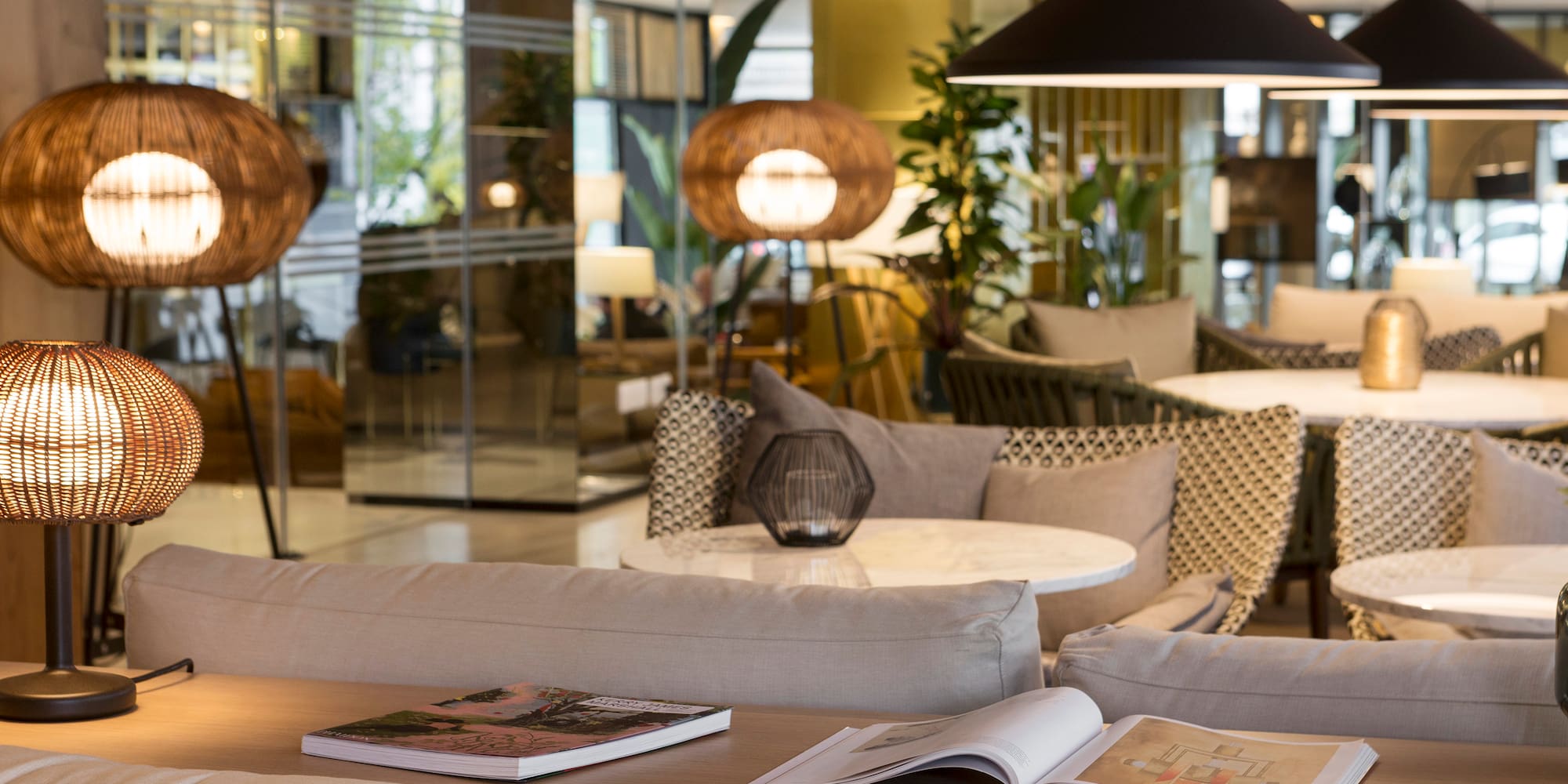 a room with a couch and chairs