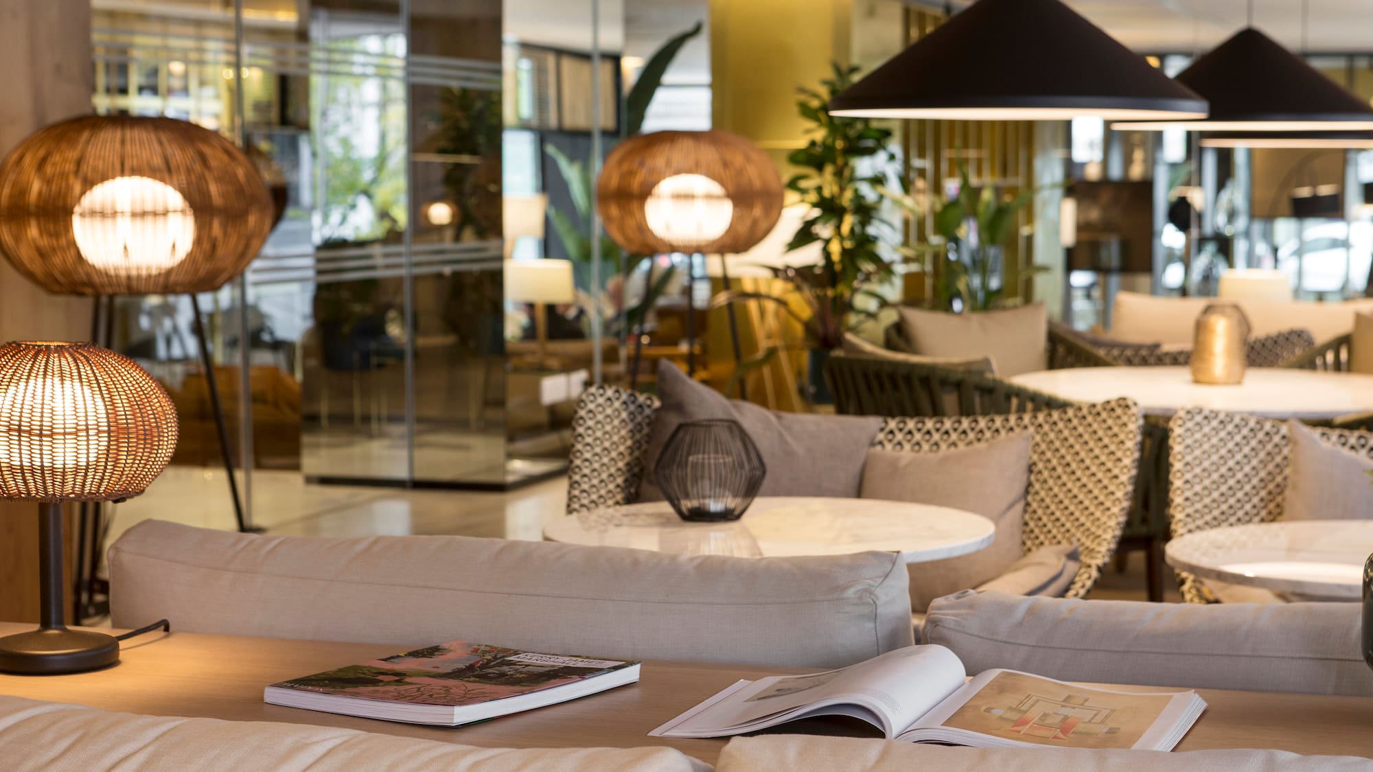 a room with a couch and chairs