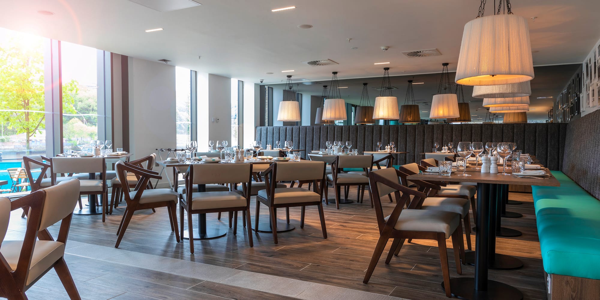 a restaurant with tables and chairs