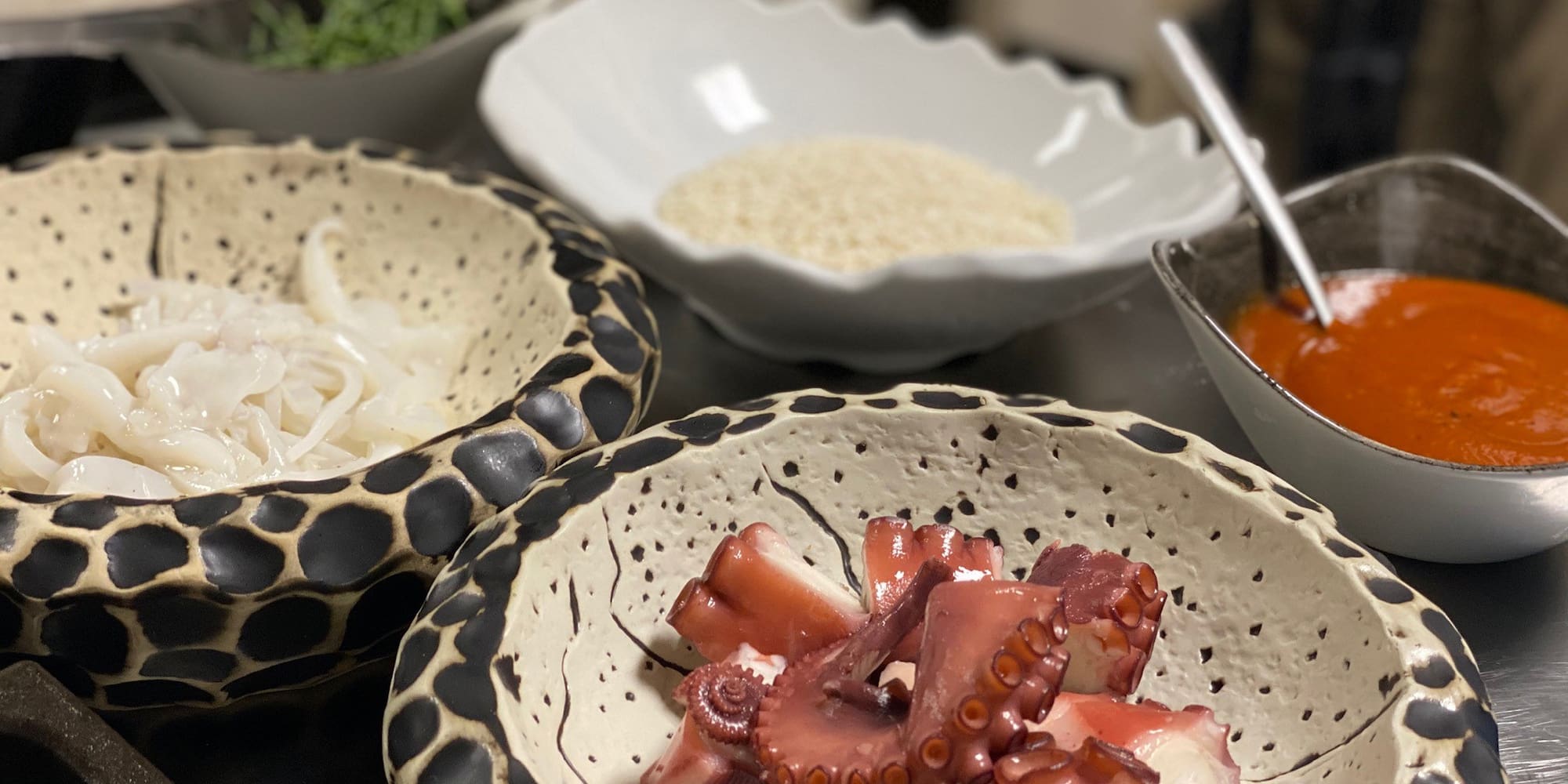 a group of bowls of food