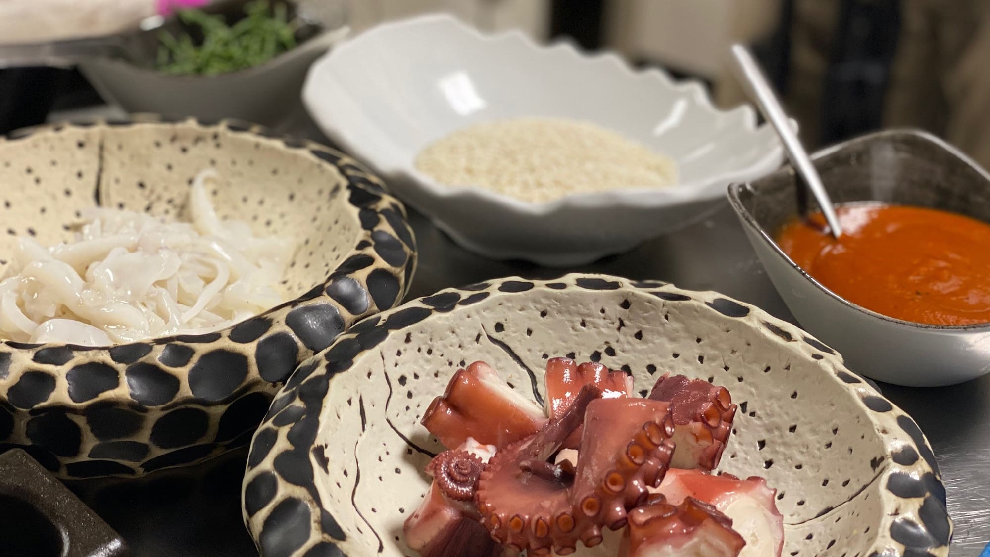 a group of bowls of food