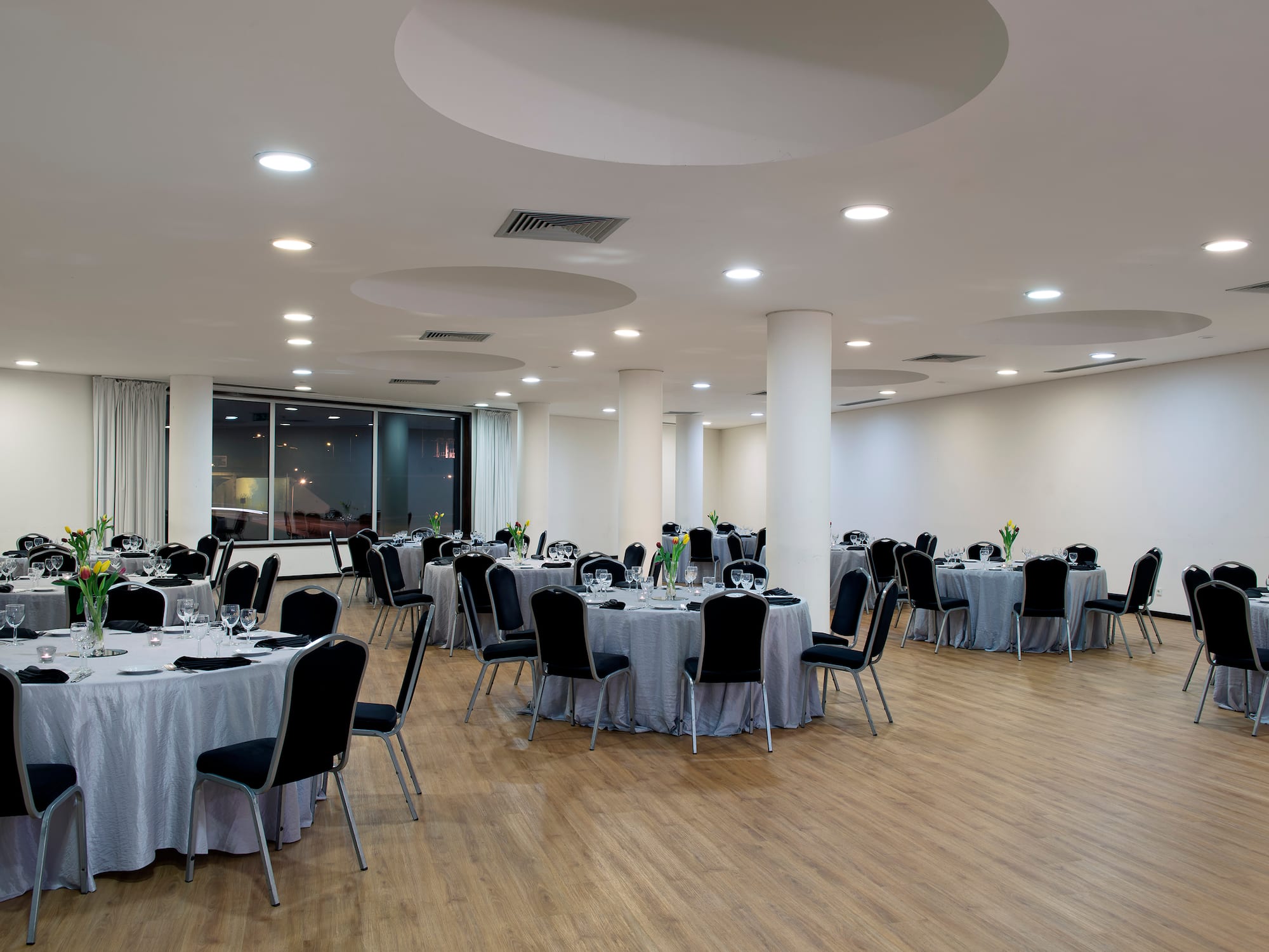 a room with tables and chairs