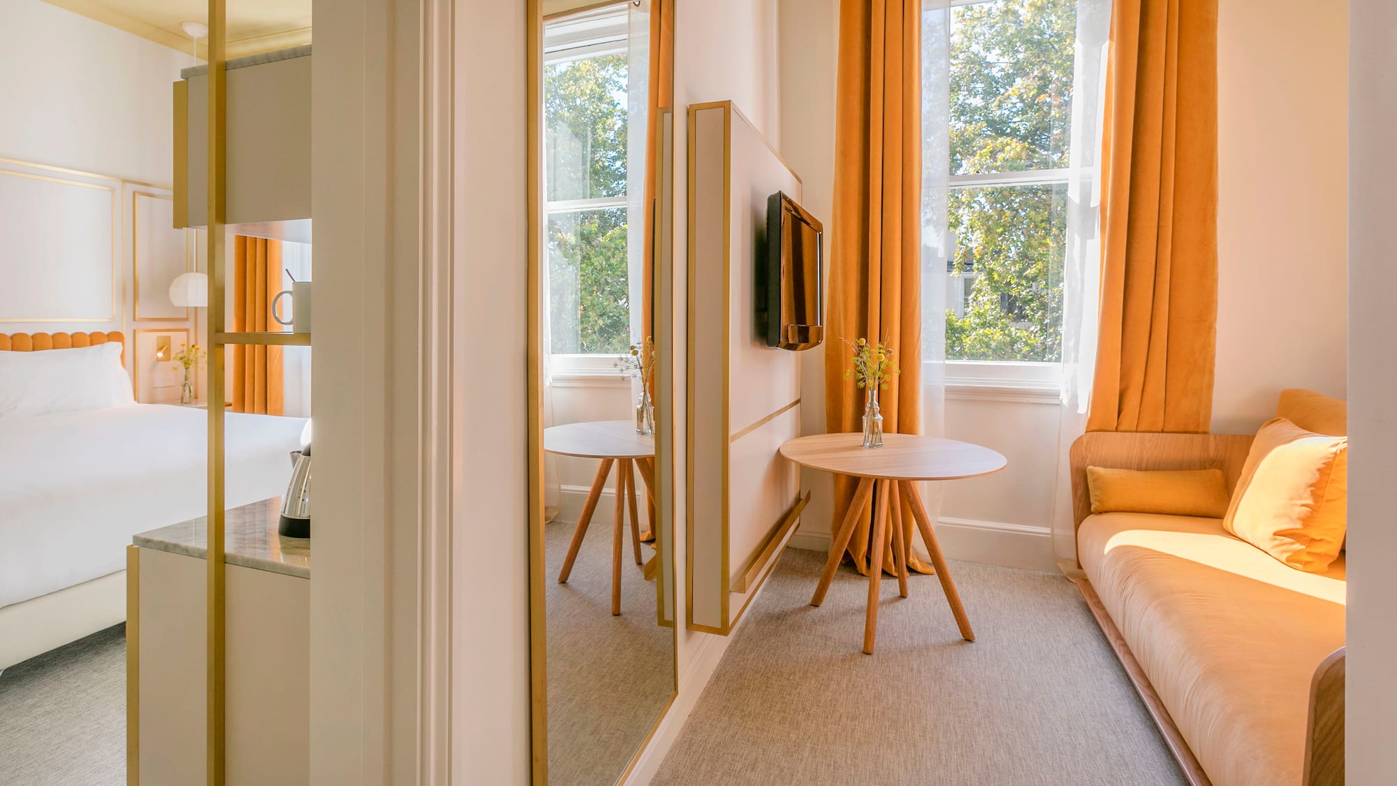 a room with a couch and a tv