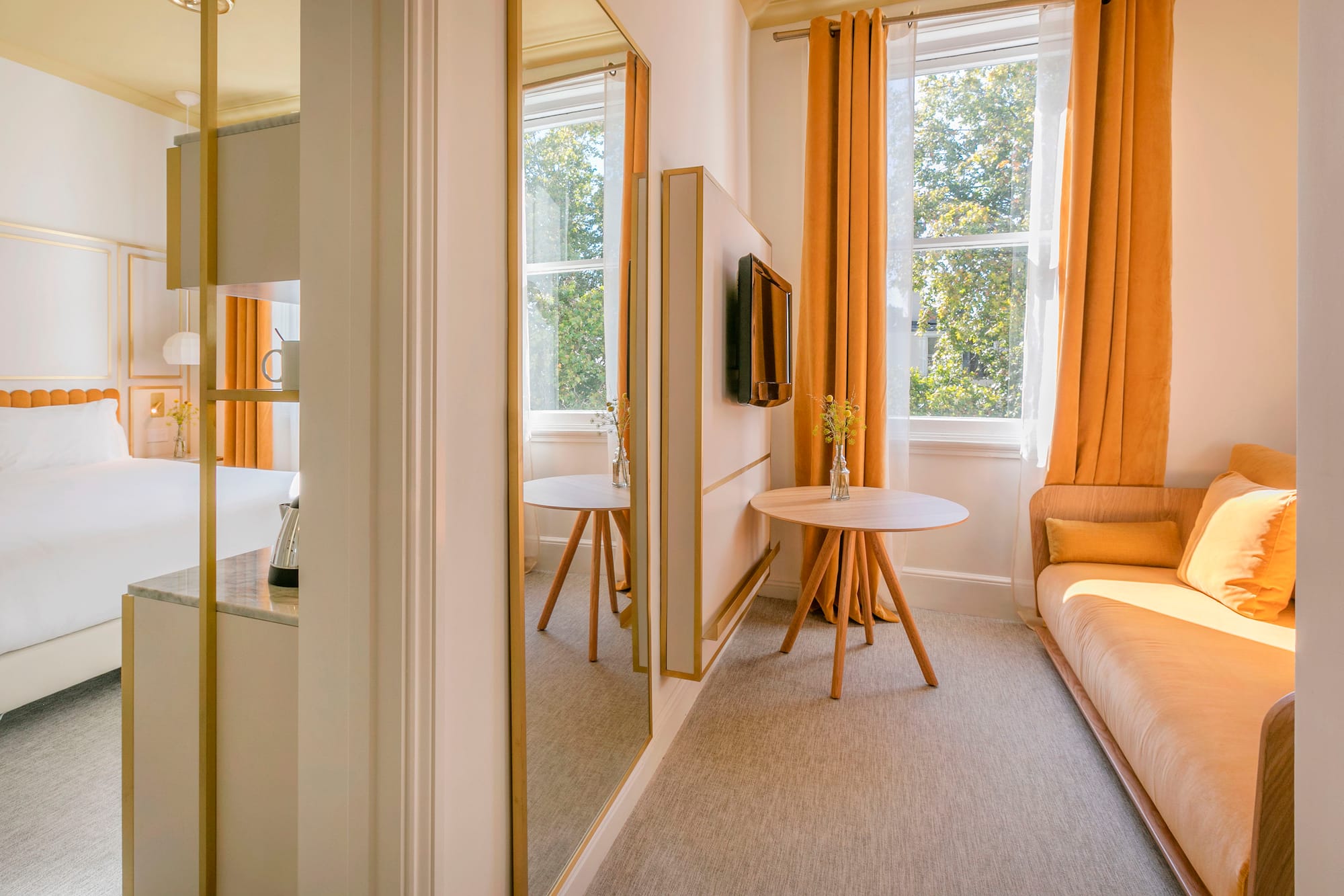 a room with a couch and a tv