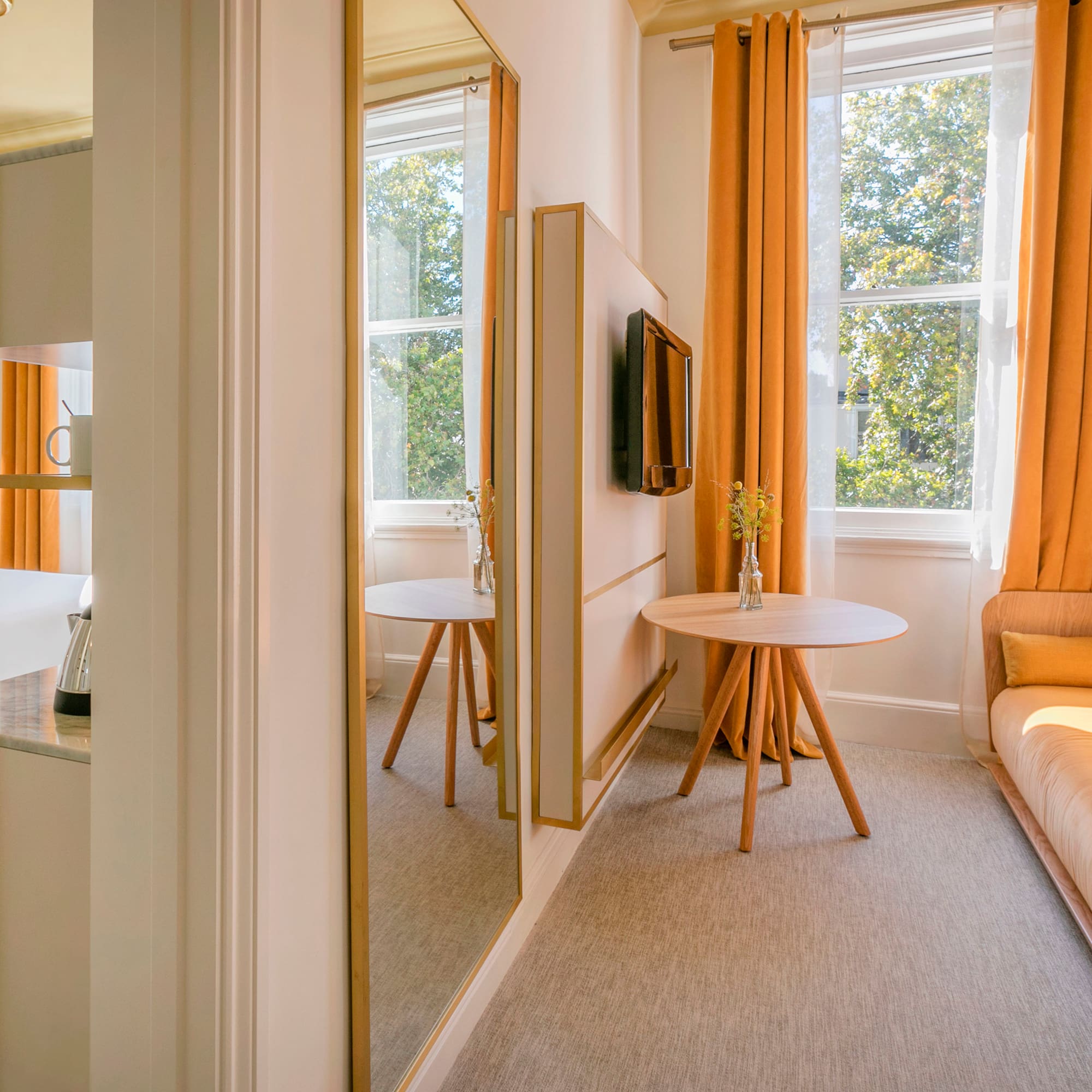 a room with a couch and a tv