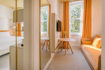 a room with a couch and a tv