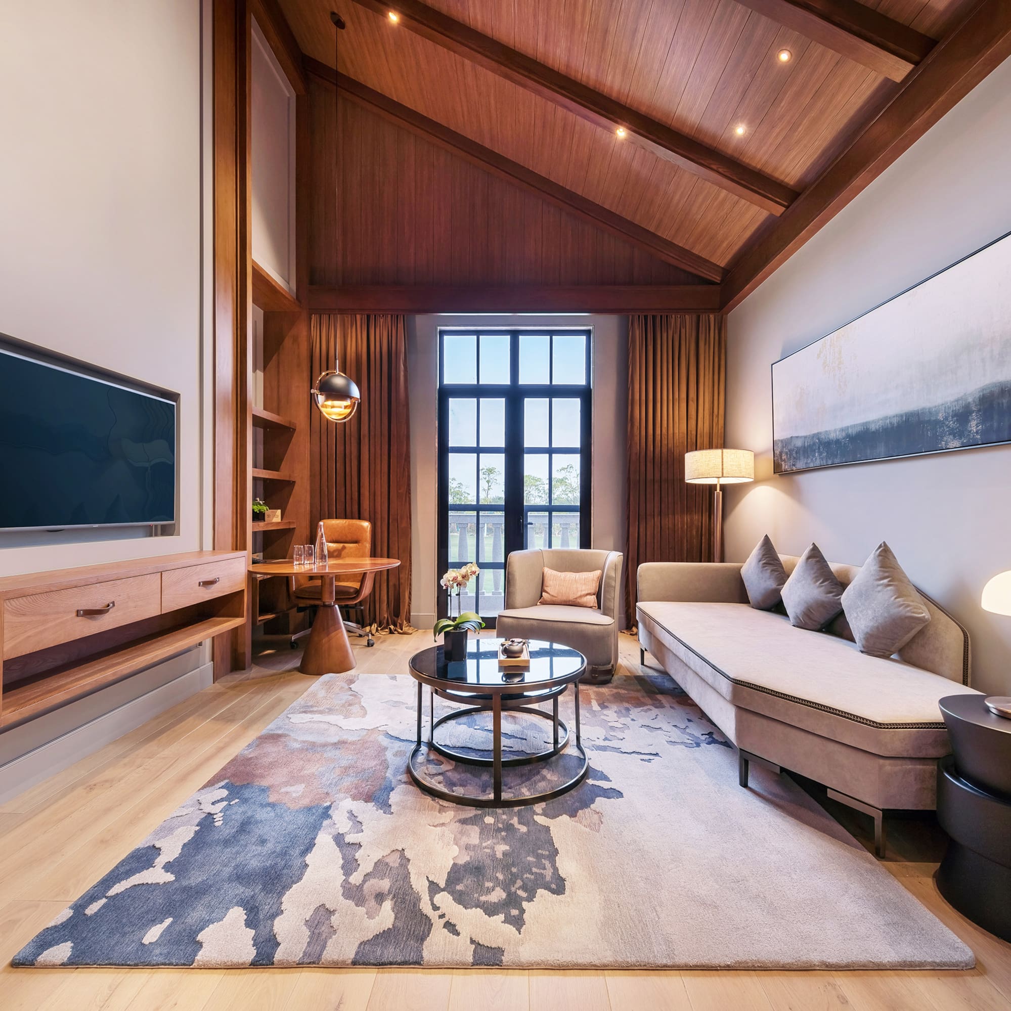 a living room with a couch and a tv