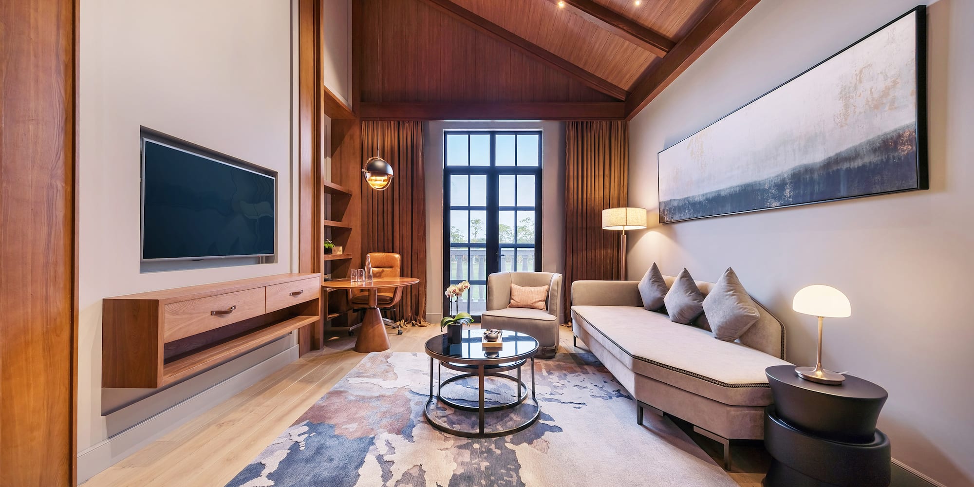 a living room with a couch and a tv