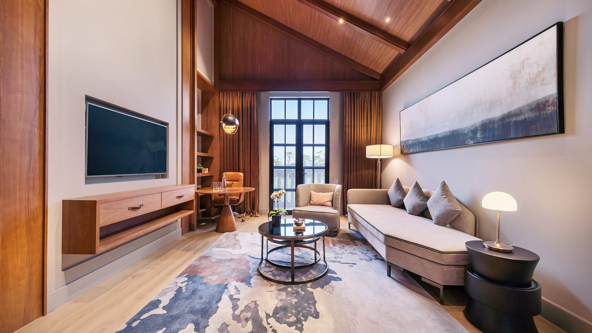 a living room with a couch and a tv