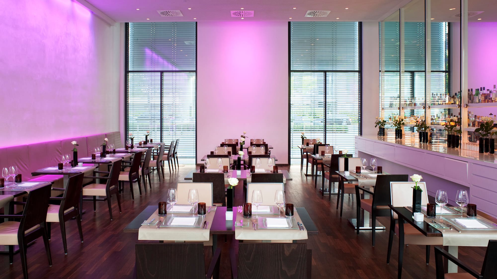 a room with tables and chairs