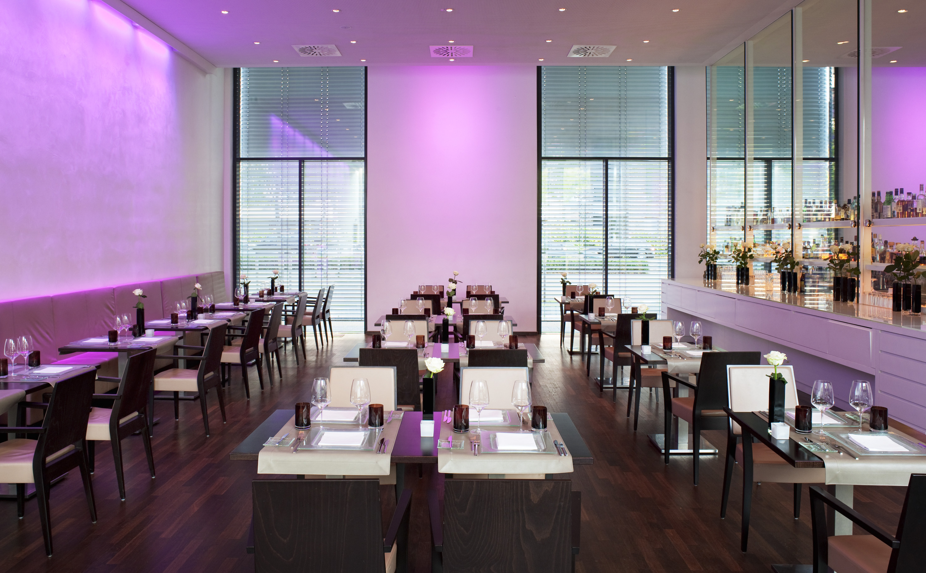 a room with tables and chairs