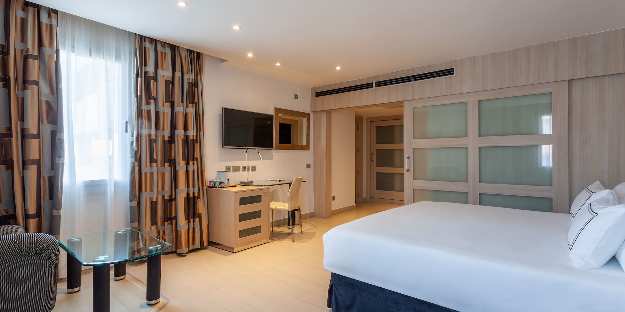 a room with a bed and a table