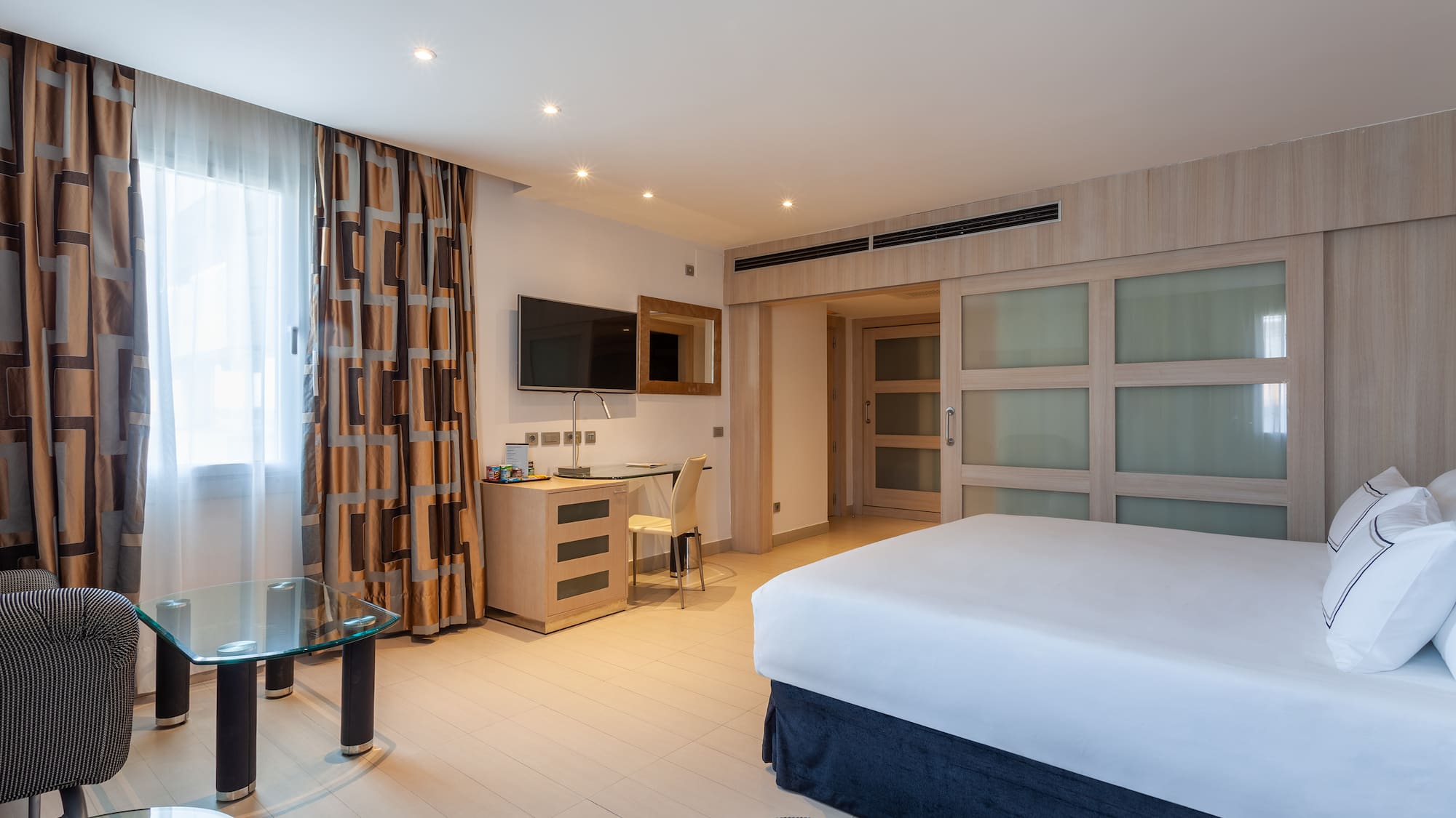 a room with a bed and a table