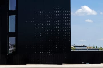 a black building with white text on it