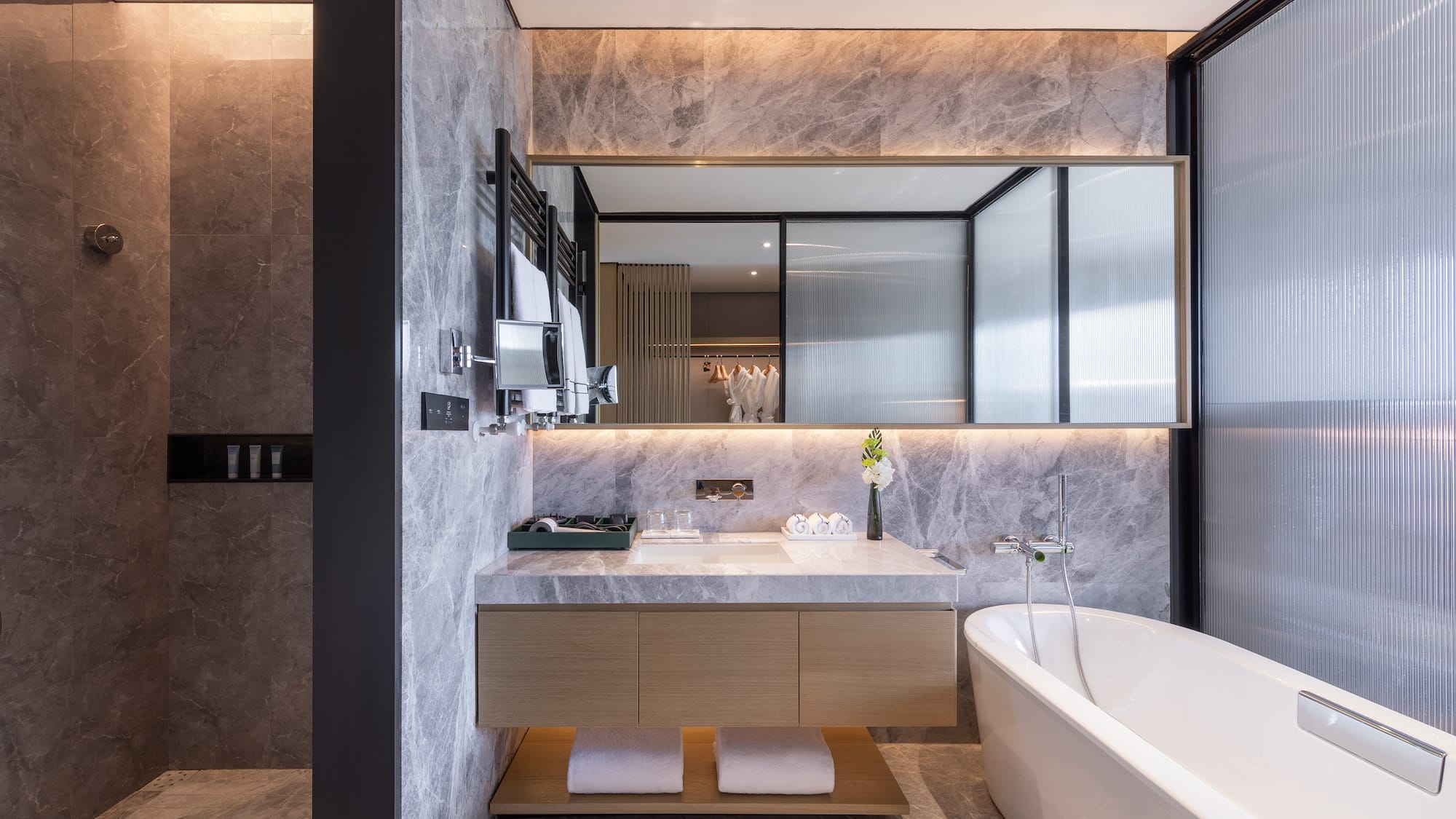 a bathroom with a bathtub and a sink