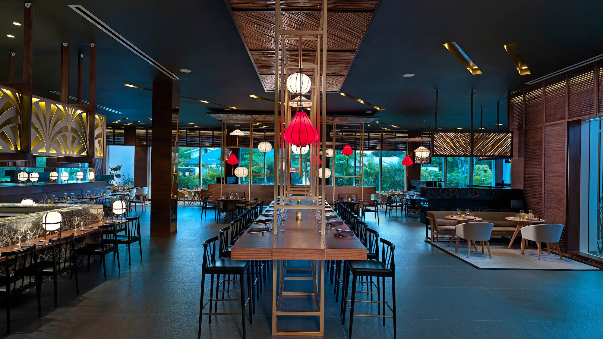 a restaurant with tables and chairs