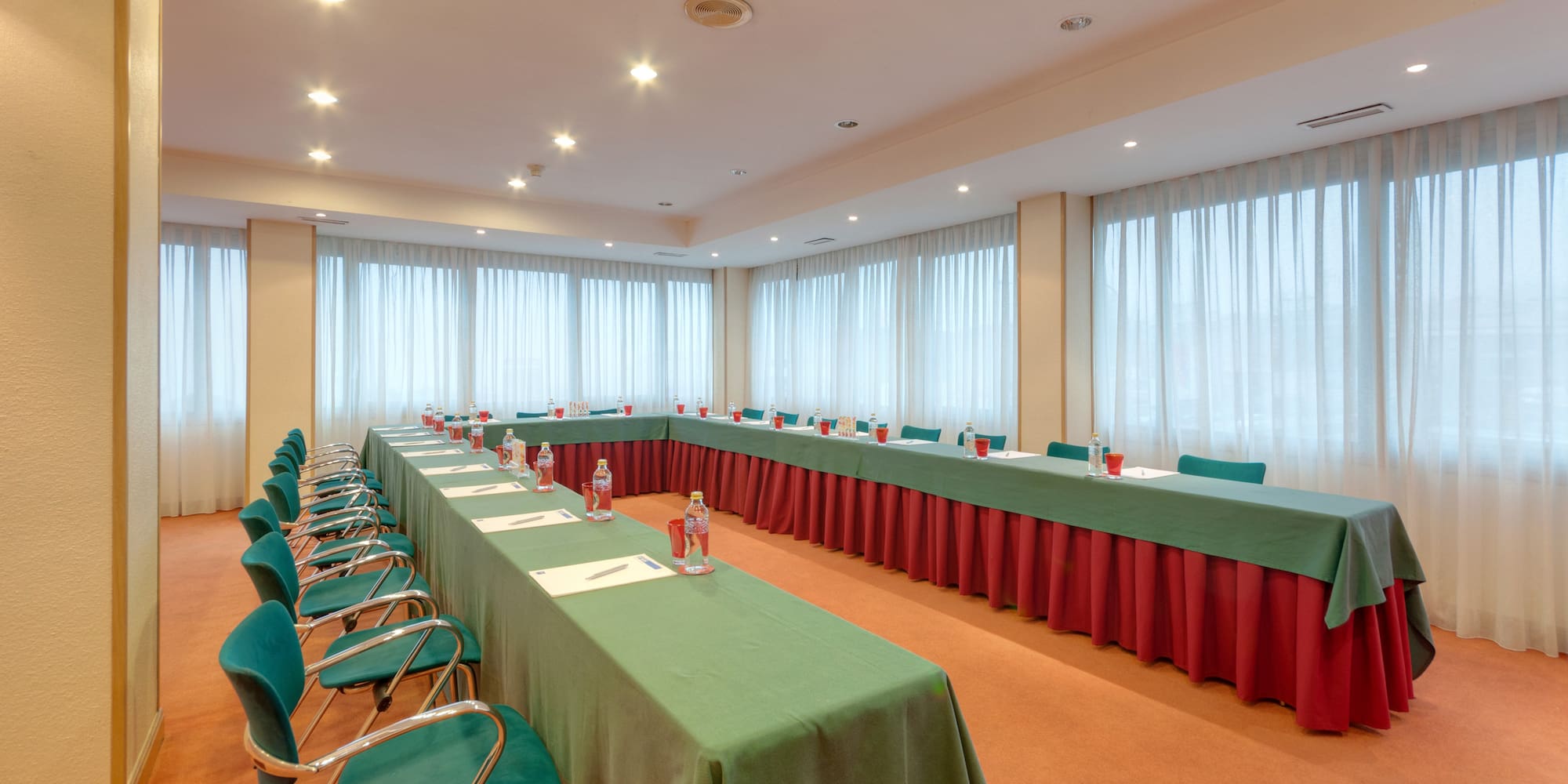 a room with tables and chairs