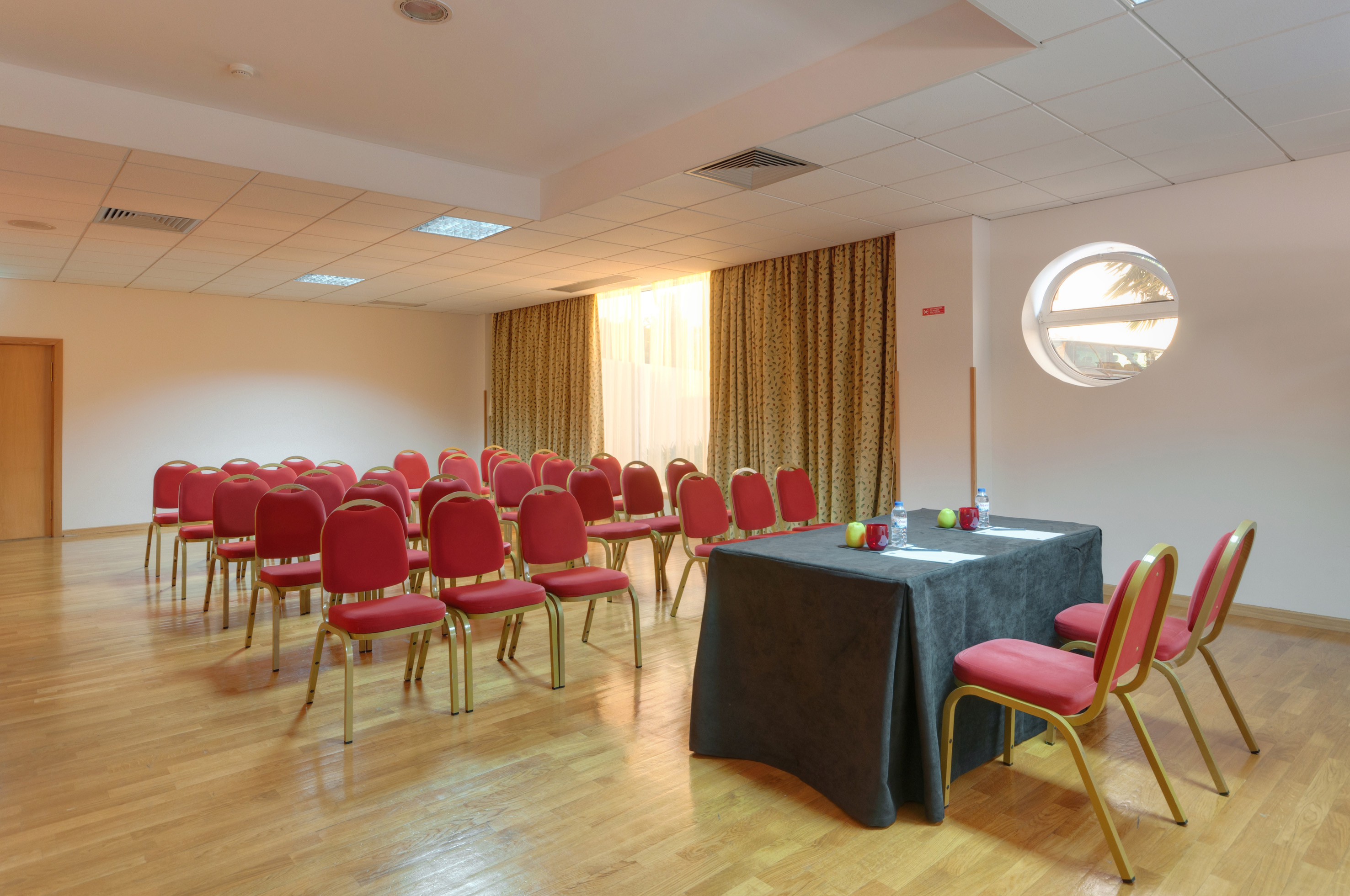 a room with a table and chairs