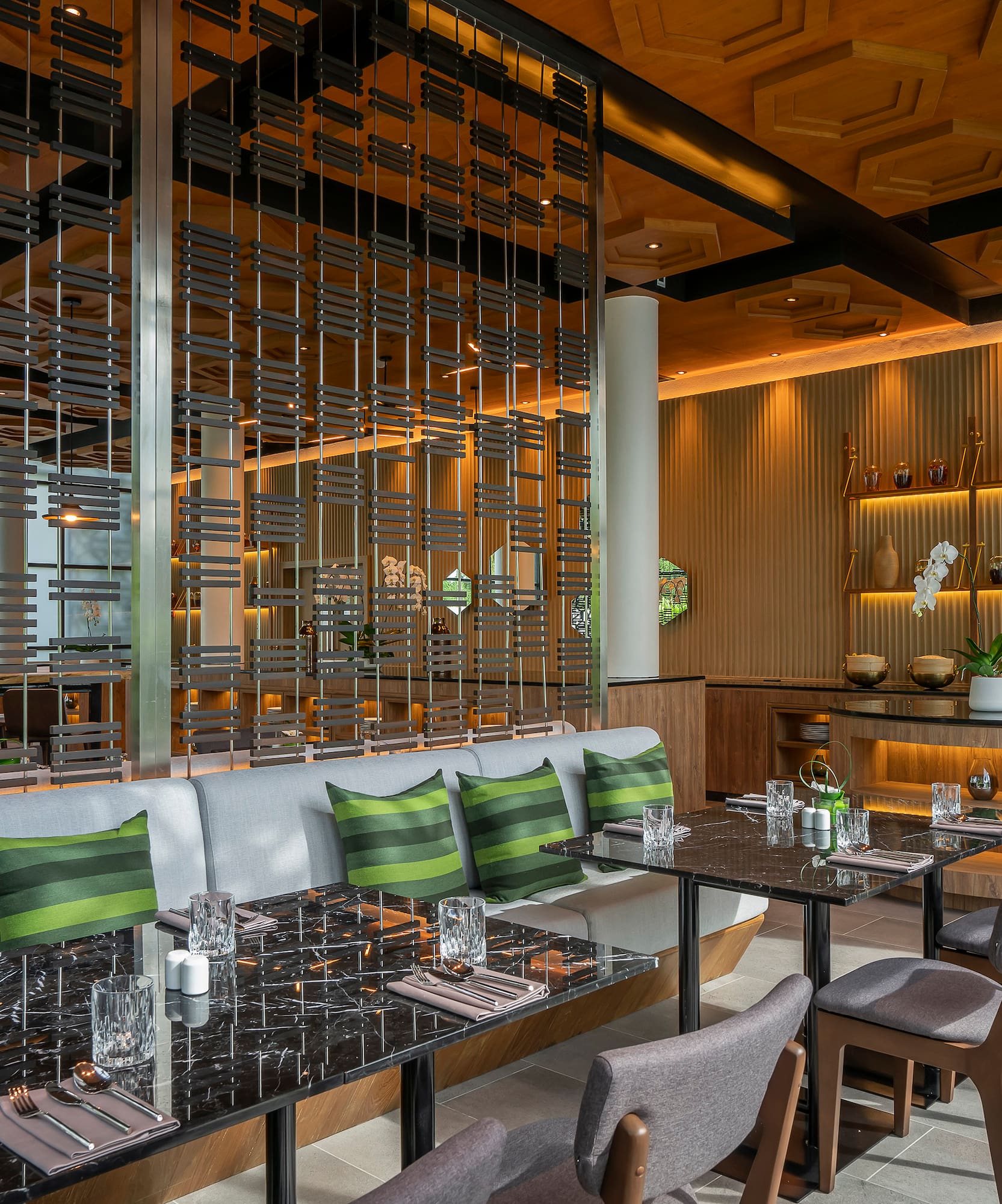 a restaurant with tables and chairs