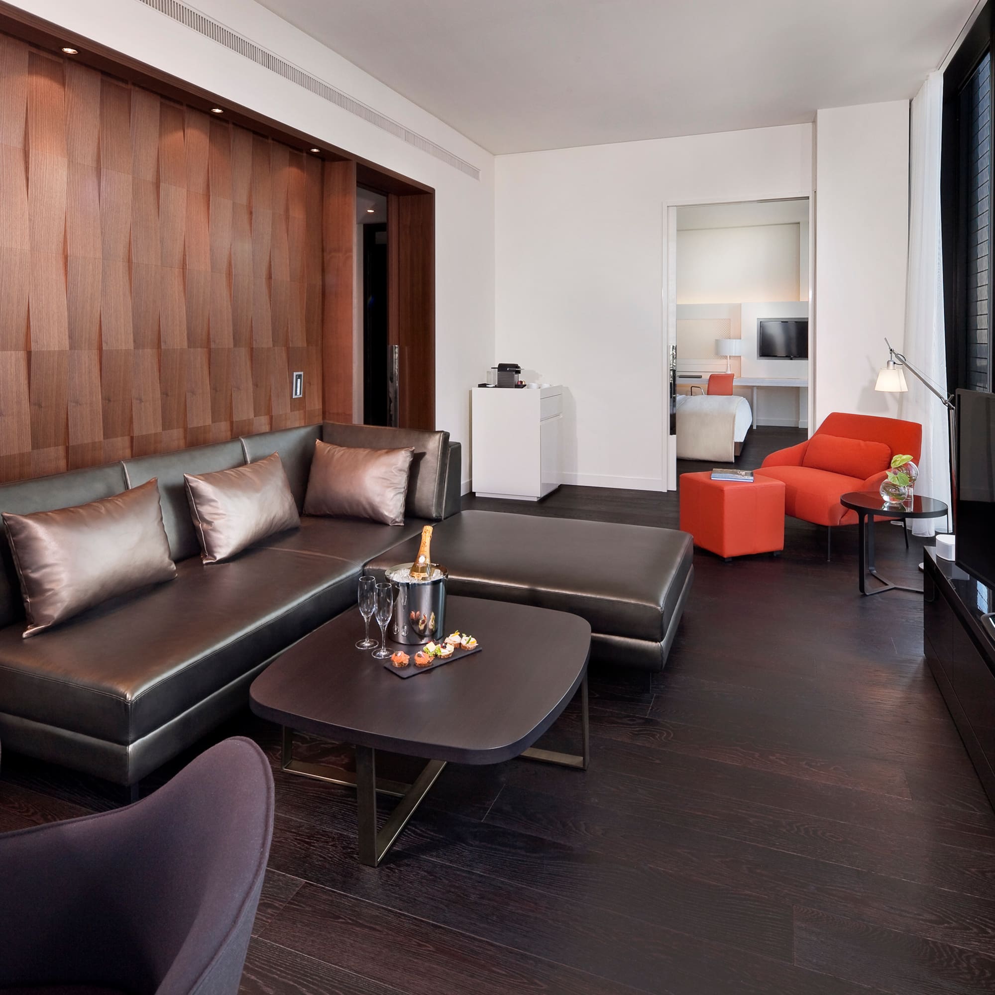 a living room with a couch and a tv